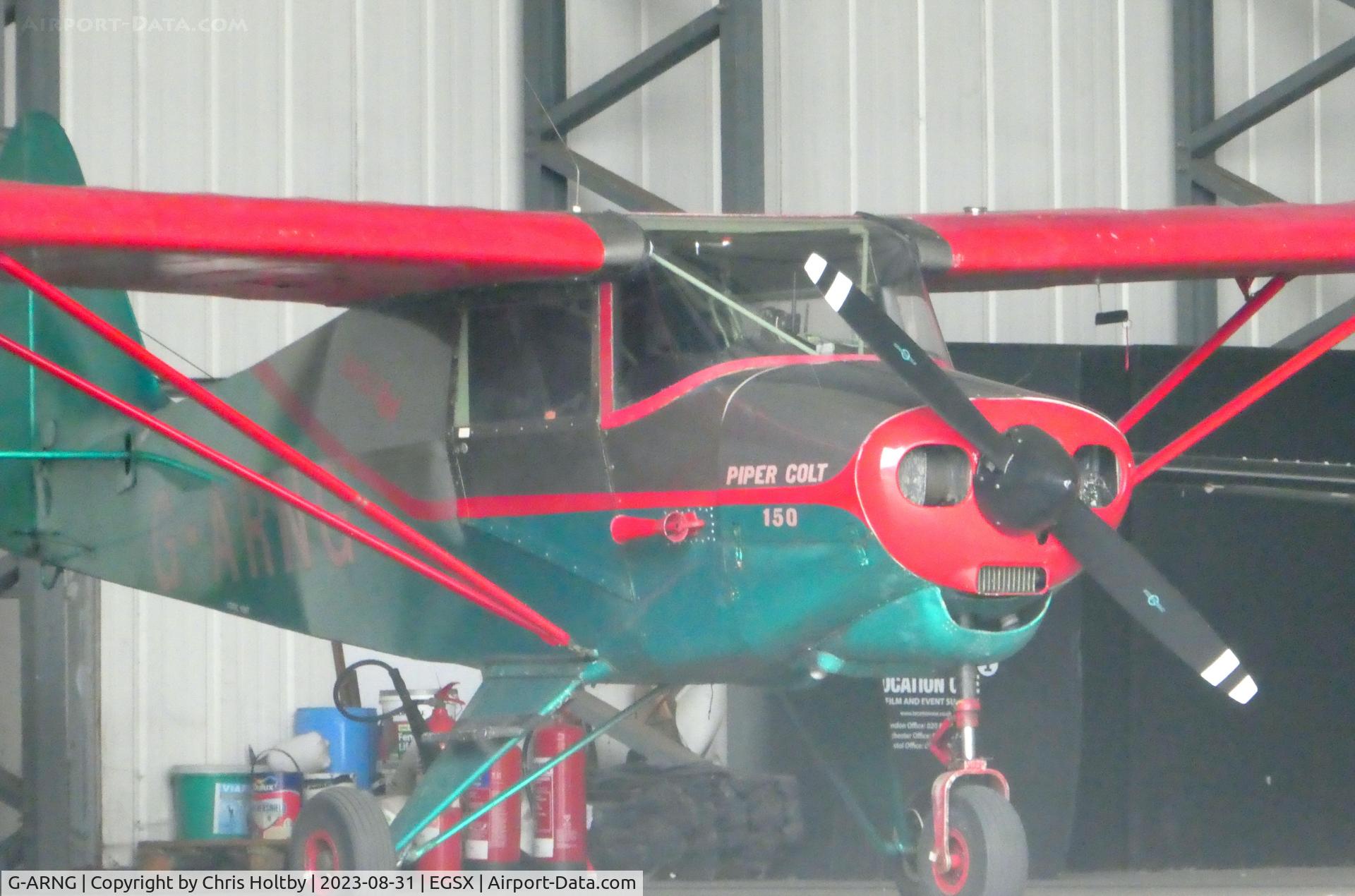 G-ARNG, 1961 Piper PA-22-108 Colt Colt C/N 22-8547, In the hangar at North Weald.