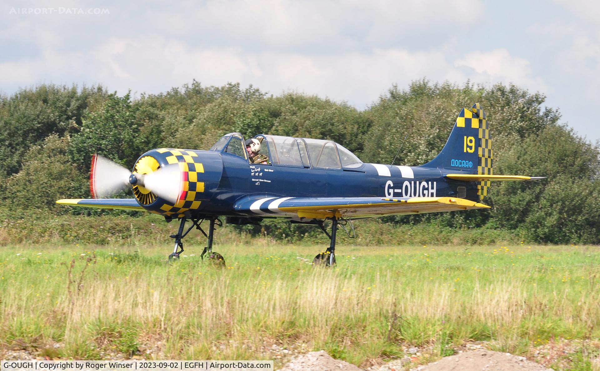 G-OUGH, 1987 Bacau Yak-52 C/N 877404, Resident Yak-52 returning to base.