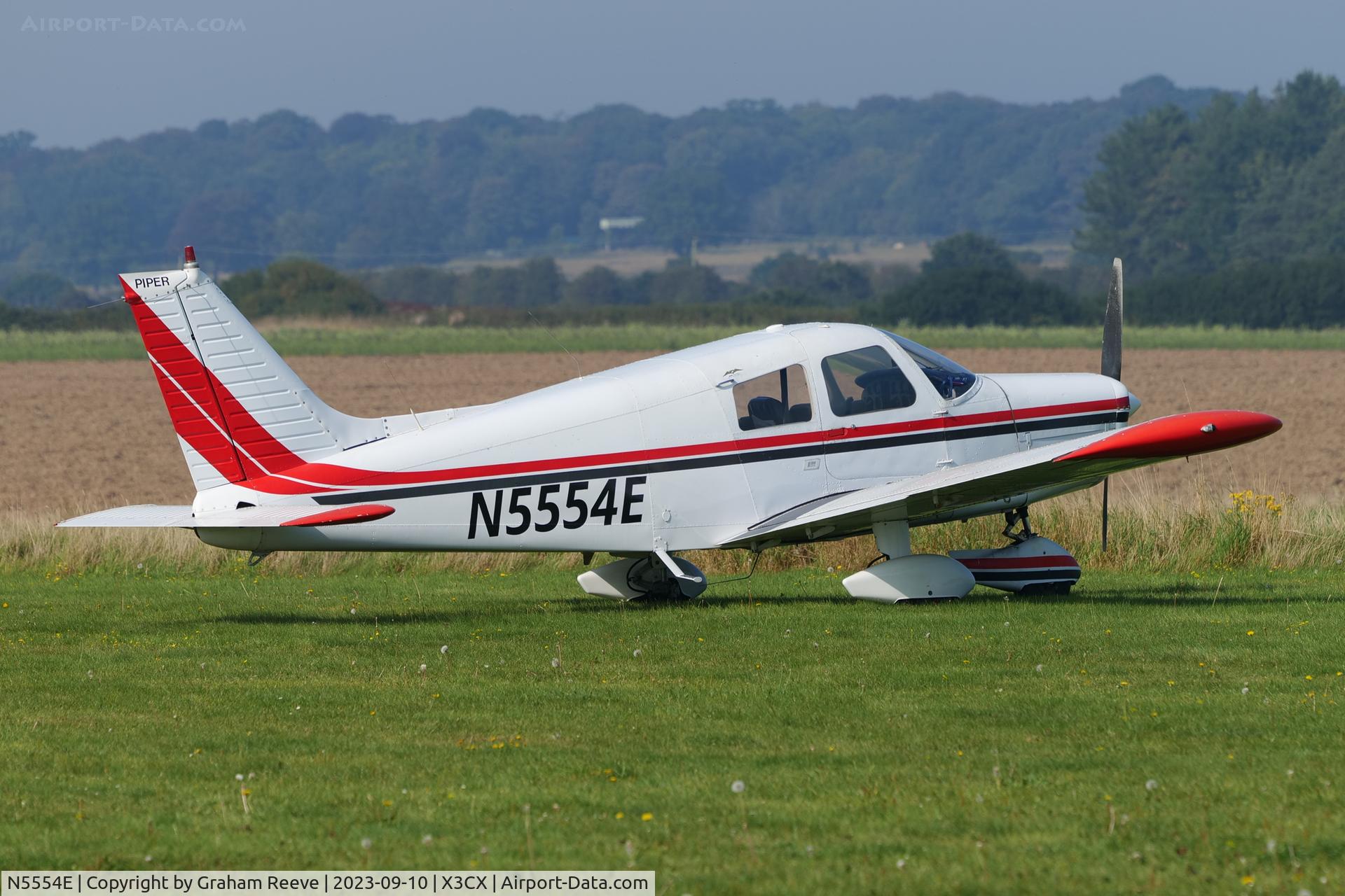 N5554E, 1977 Piper PA-28-140 Cherokee Cruiser C/N 28-7725152, Parked at Northrepps.