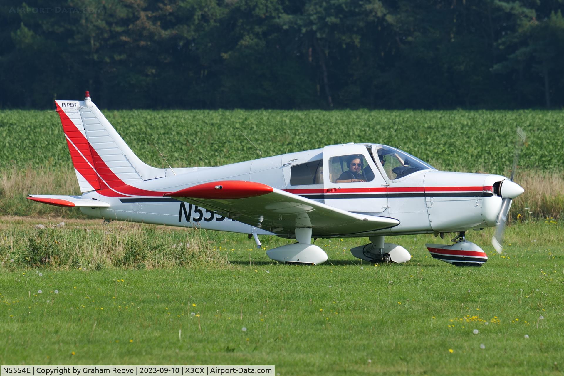 N5554E, 1977 Piper PA-28-140 Cherokee Cruiser C/N 28-7725152, Just landed at Northrepps.