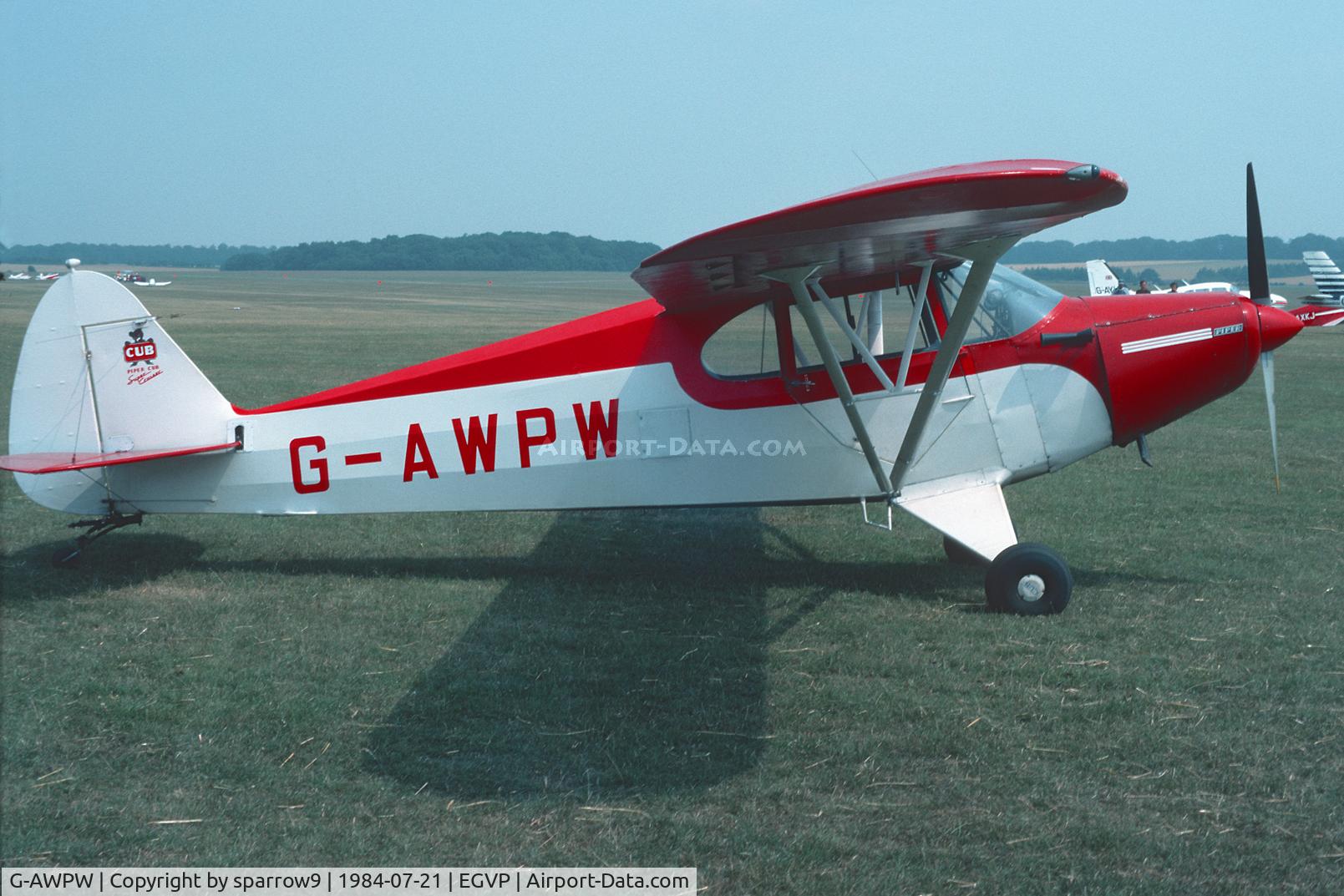 G-AWPW, 1947 Piper PA-12 Super Cruiser C/N 12-3947, Air Britain Rally at Middle-Wallop. Scanned from a slide.