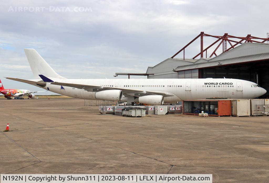 N192N, 1998 Airbus A340-313X C/N 245, Parked with additional 'World Cargo' titles...