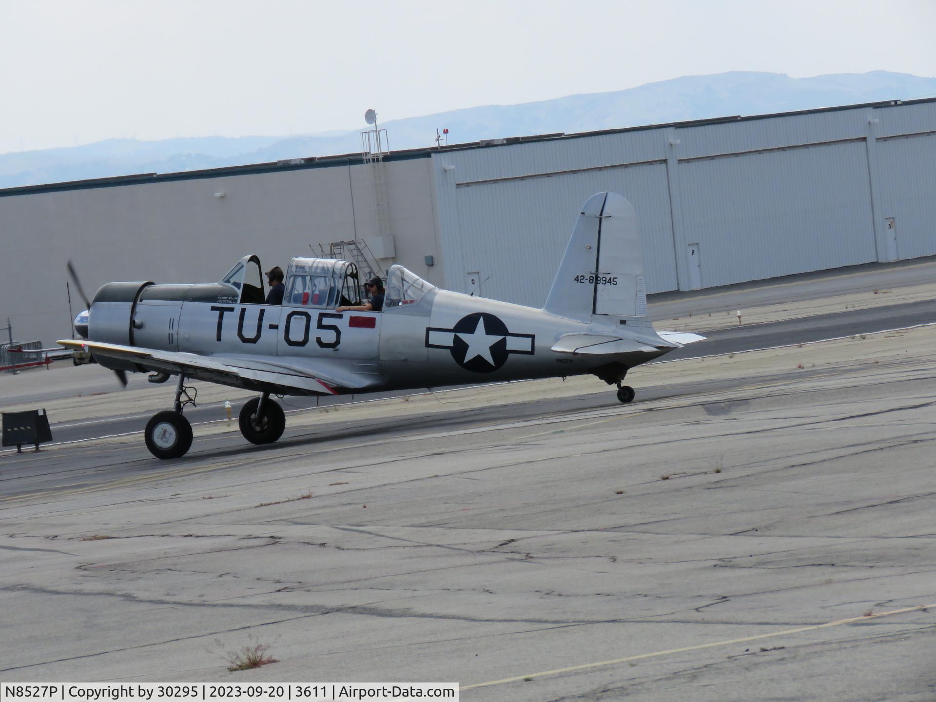 N8527P, 1980 Consolidated Vultee BT-13 C/N 79-758, Taxiing across runway