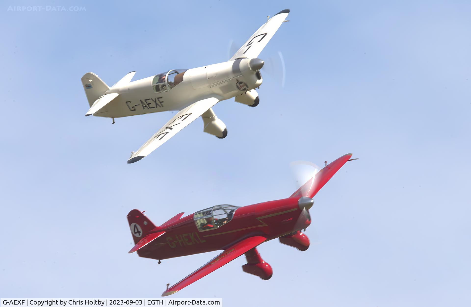 G-AEXF, 1936 Percival E-2H Mew Gull C/N E22, Flying in a pair with its replica (G-HEKL) at the Vintage Airshow, Old Warden 2023