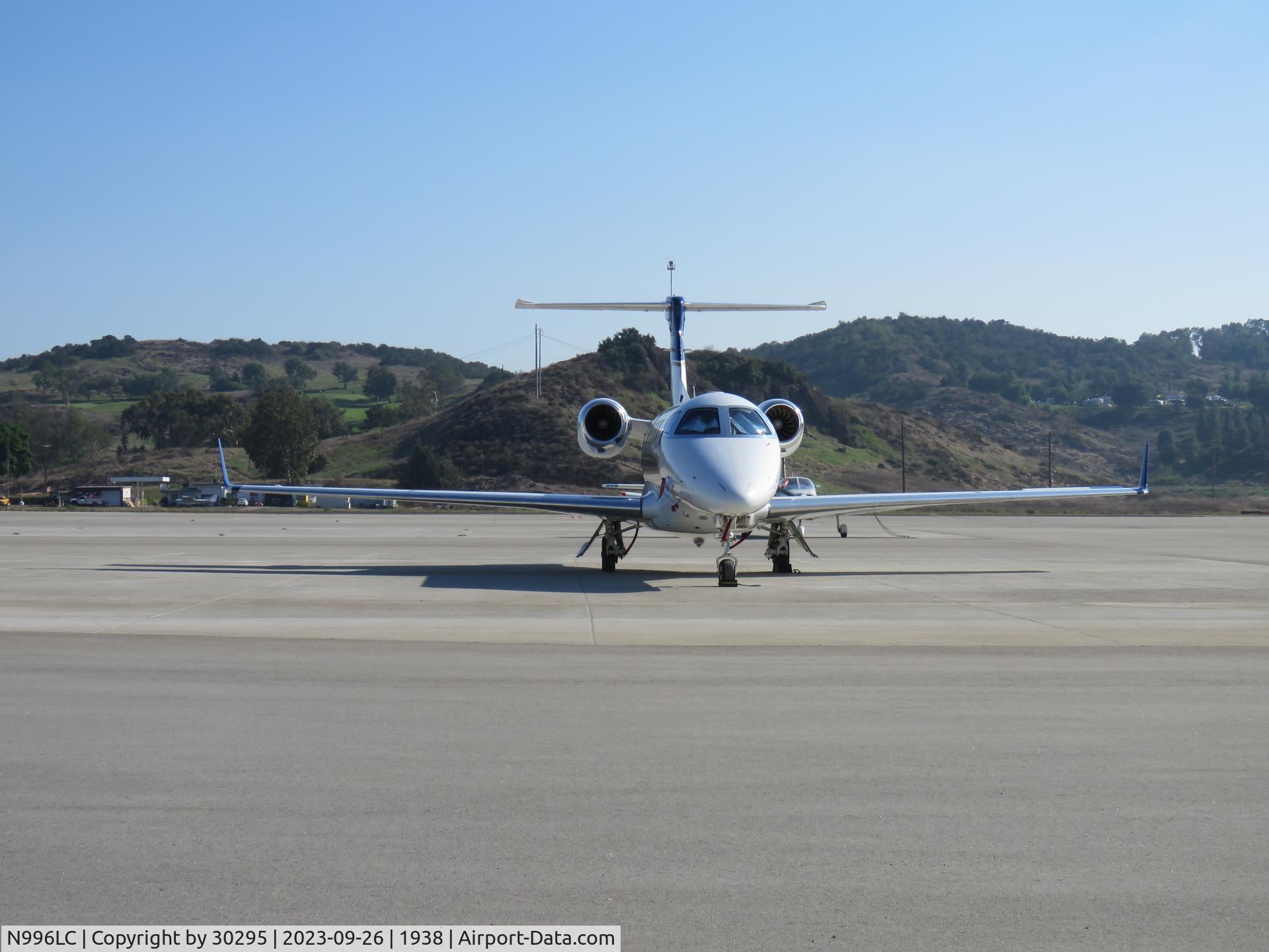N996LC, 2015 Embraer EMB-505 Phenom 300 C/N 50500271, Facing north