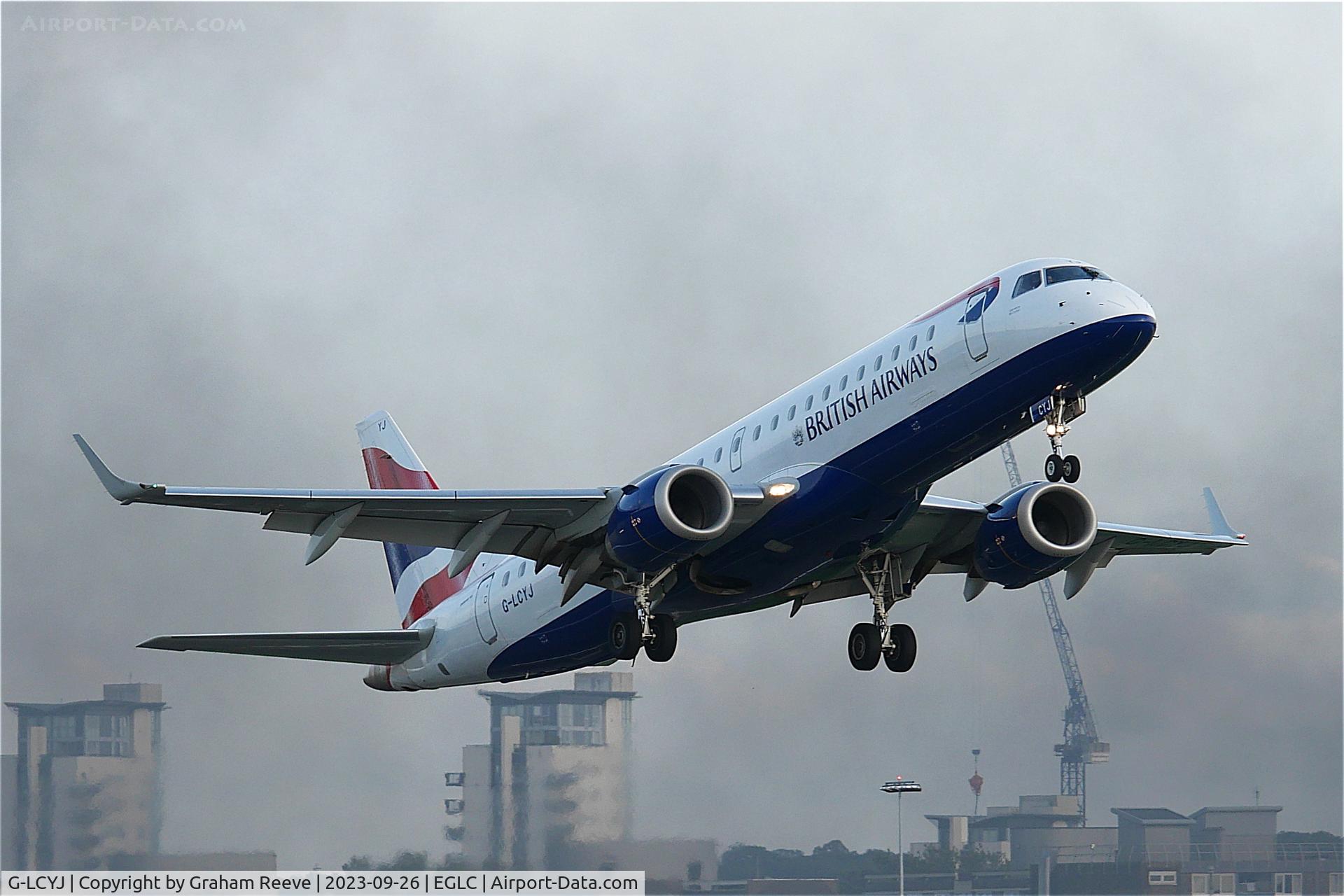 G-LCYJ, 2010 Embraer 190SR (ERJ-190-100SR) C/N 19000339, Departing from London City Airport through the smoke from a near by fire.