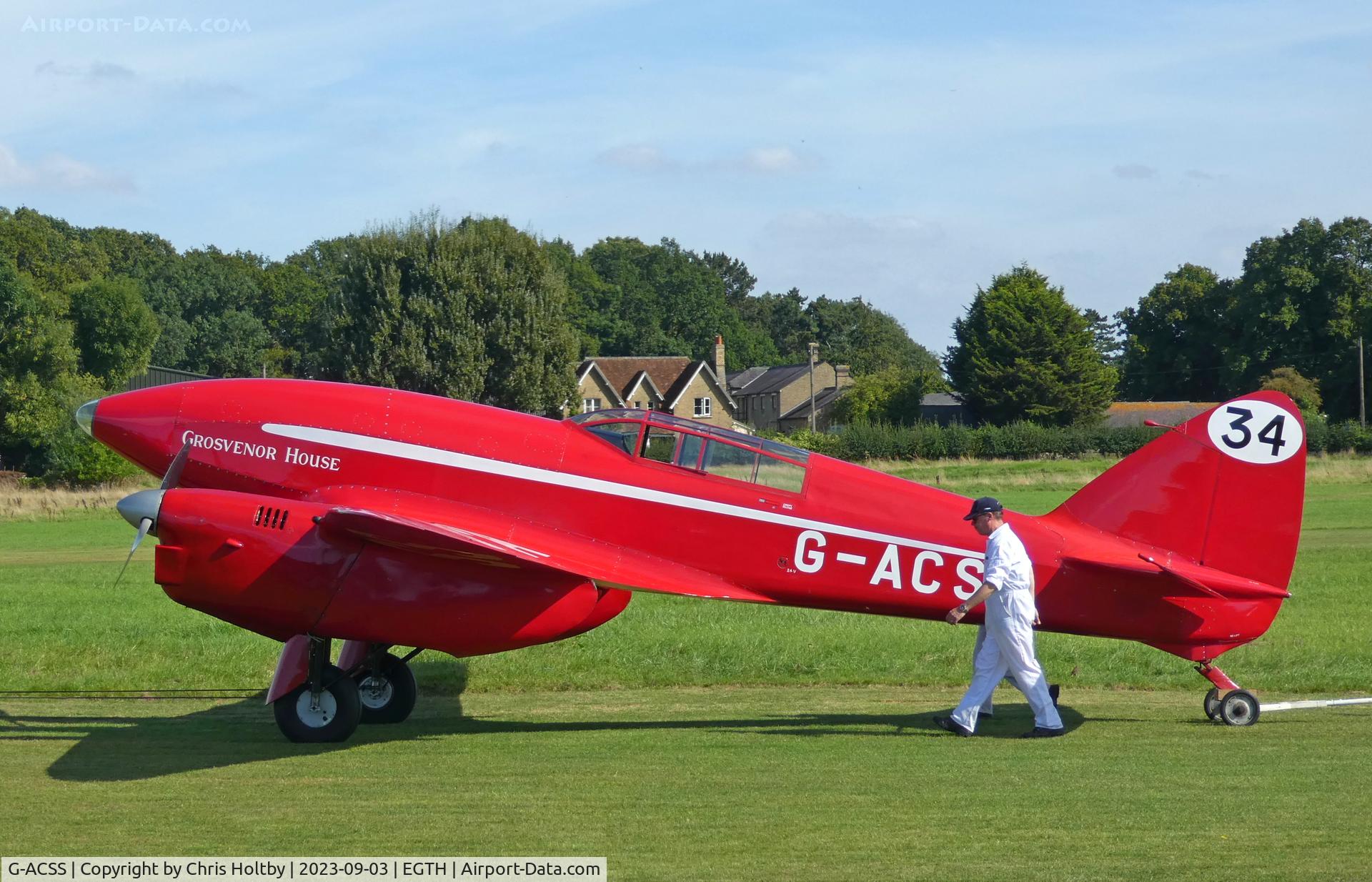G-ACSS, 1934 De Havilland DH-88 Comet C/N 1996, Being towed back to the Collection hangars during the Vintage Airshow at Old Warden