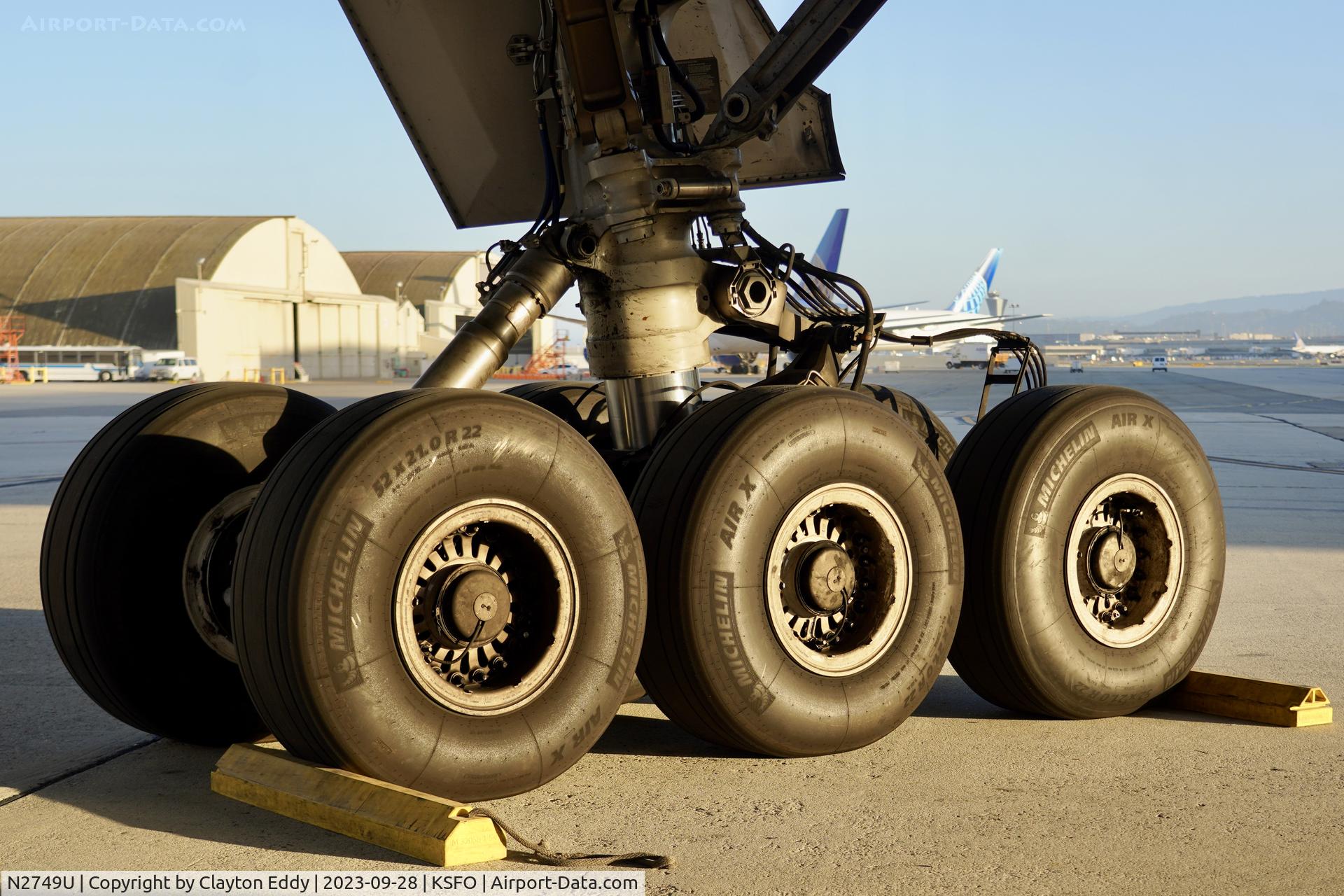 N2749U, 2019 Boeing 777-300/ER C/N 66589, Right main gear. SFO 2023.