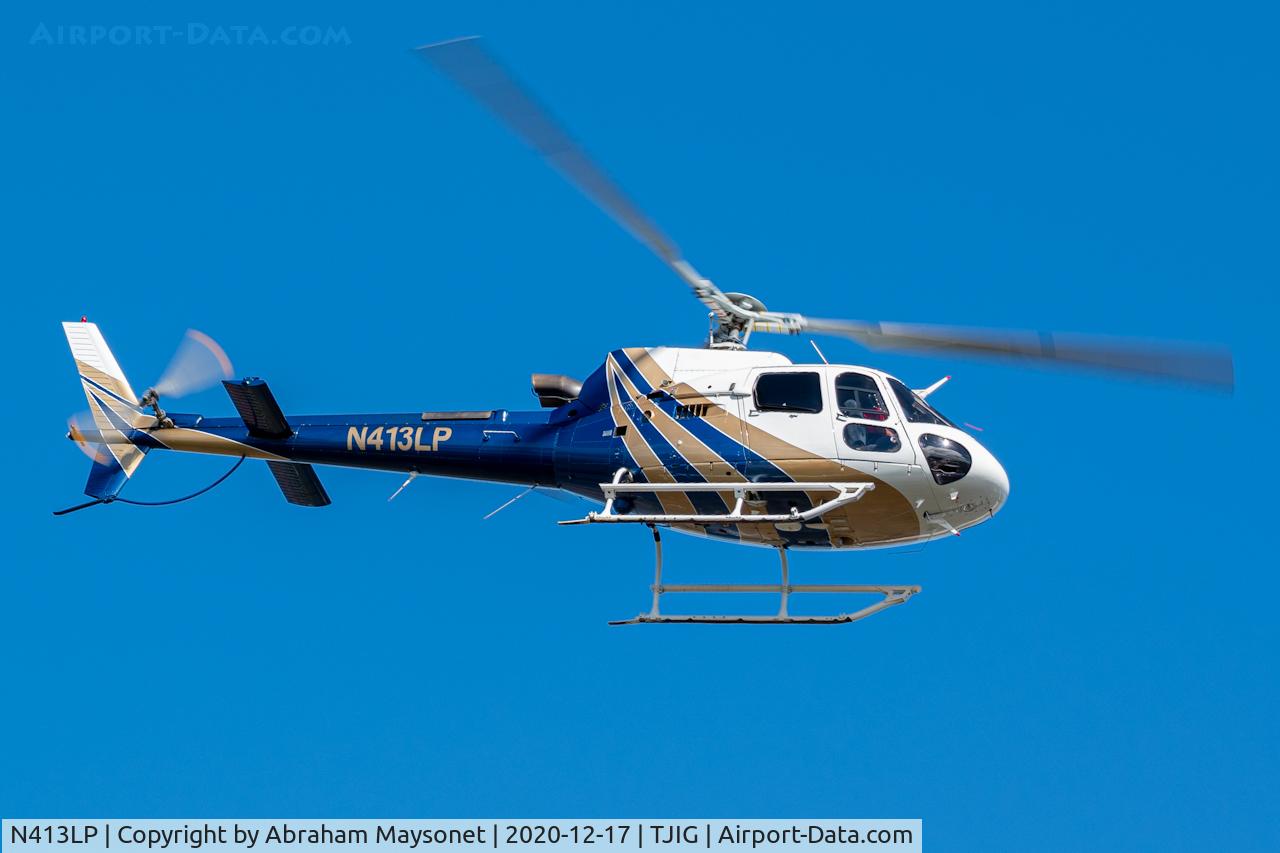 N413LP, 1999 Eurocopter AS-350B-3 Ecureuil C/N 3228, Departure with new Scheme paint at TJIG Airport