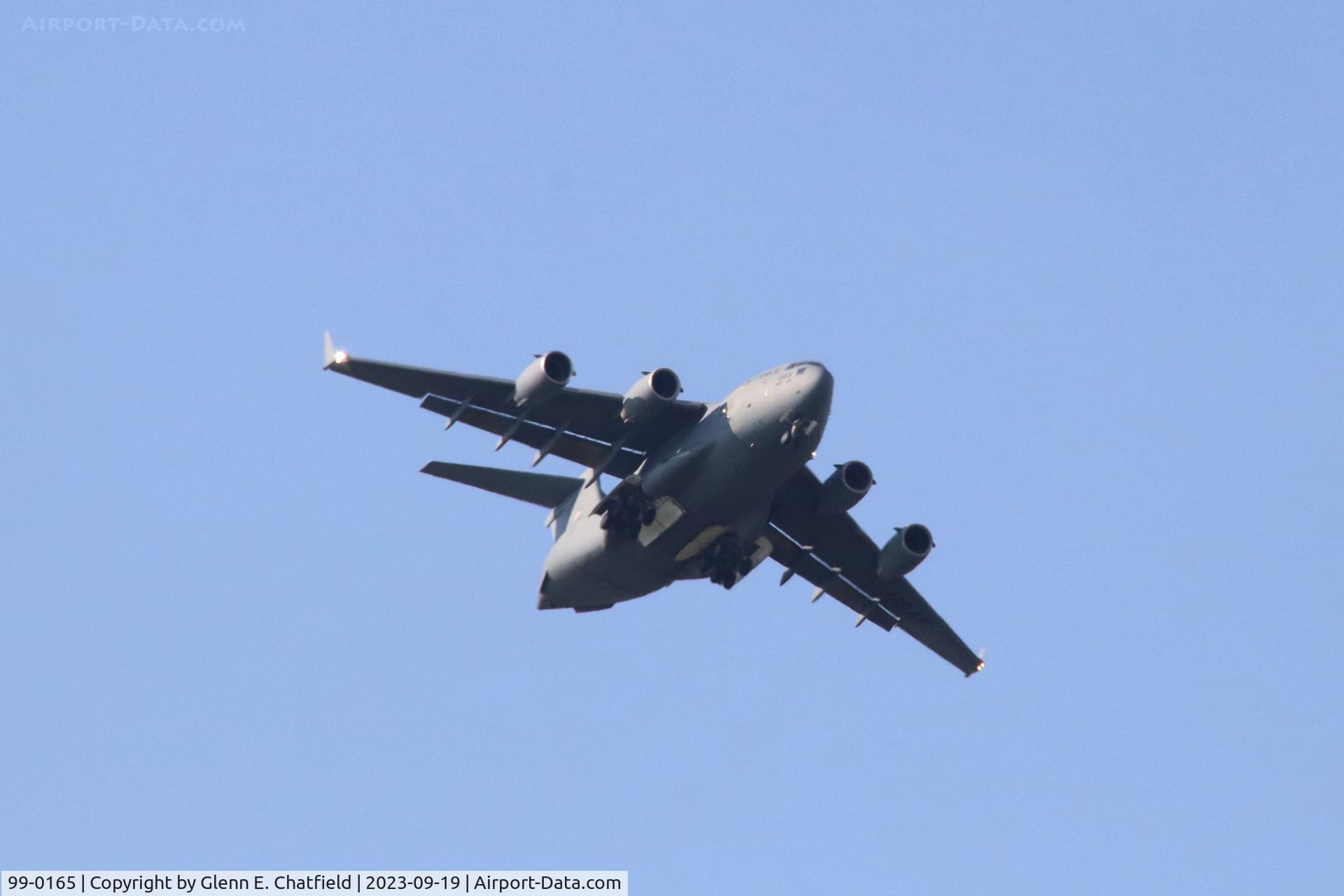 99-0165, 1999 Boeing C-17A Globemaster III C/N 50069/P-65, Flying over the National Museum of the USAF