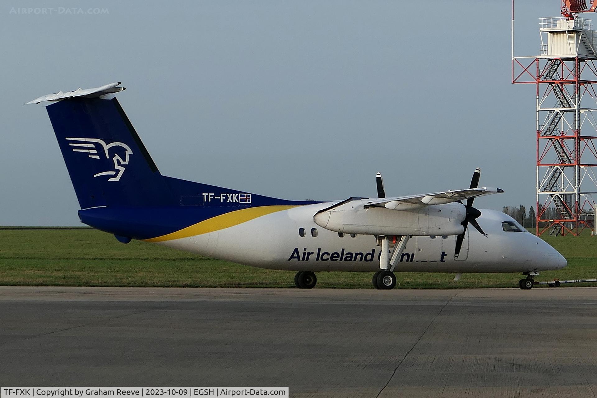 TF-FXK, 1996 De Havilland Canada DHC-8-202 Dash 8 C/N 446, Under tow at Norwich.