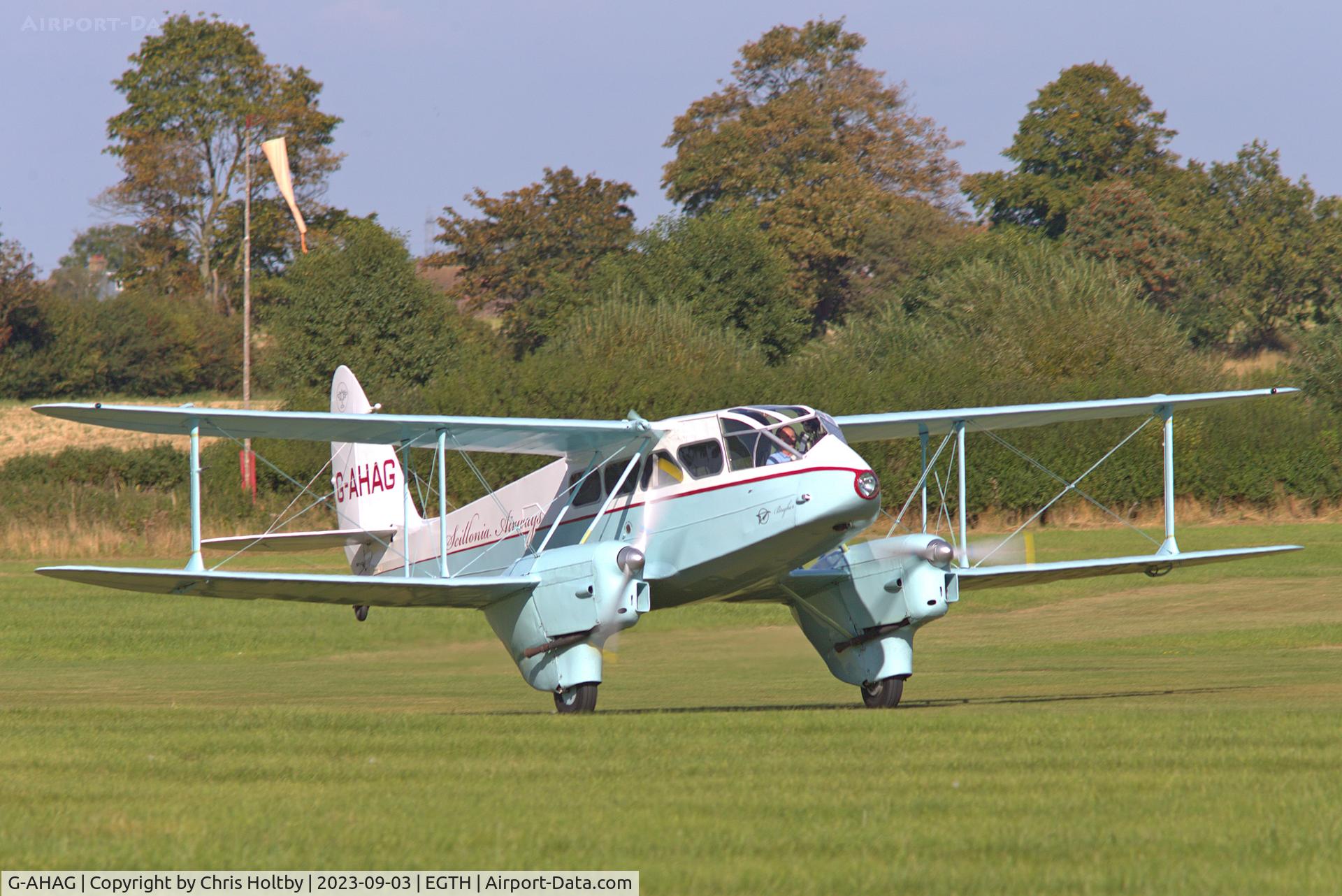 G-AHAG, 1945 De Havilland DH-89A Dominie I/Dragon Rapide C/N 6926, Taking off for another pleasure flight at Old Warden