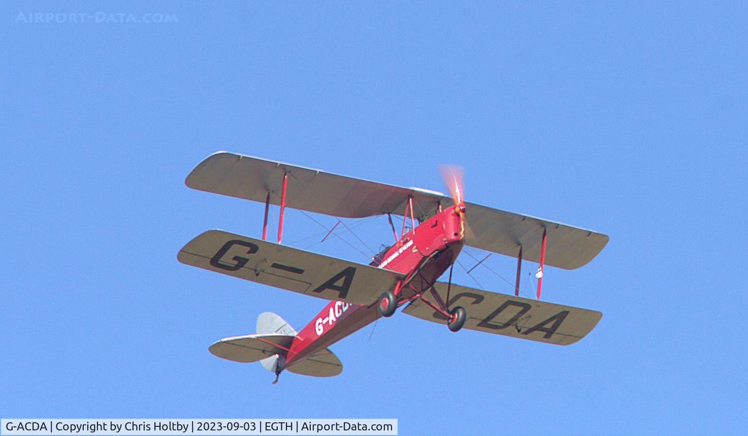 G-ACDA, 1934 De Havilland DH-82A Tiger Moth II C/N 3175, In formation over Old Warden with 8 other Moths on the Vintage Airshow day 2023