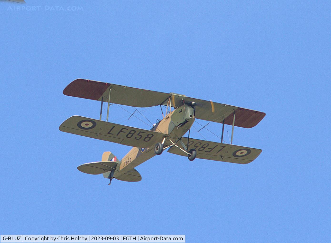 G-BLUZ, 1944 De Havilland DH.82B Queen Bee C/N 1435, The odd-one-out in the formation of Tiger Moths over Old Warden for the Vintage Airshow 2023 the 1944 Queen Bee.