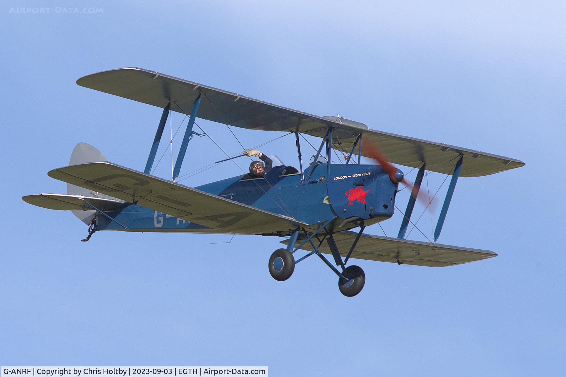 G-ANRF, 1941 De Havilland DH-82A Tiger Moth II C/N 83748, Flypast with a wave to the crowd at the Vintage Airshow, Old Warden 2023