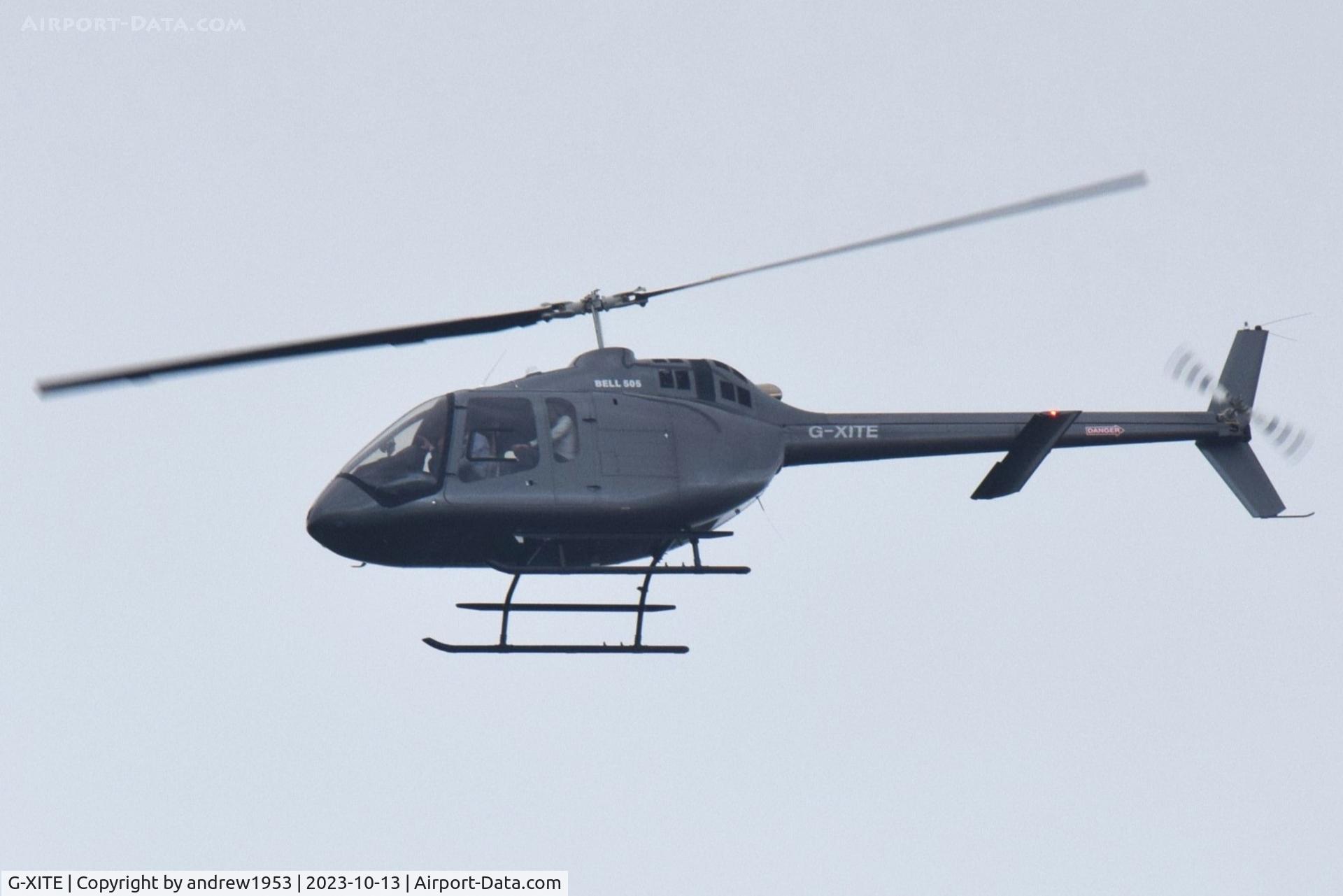 G-XITE, 2022 Bell 505 Jet Ranger X C/N 65388, G-XITE over the Bristol Channel.