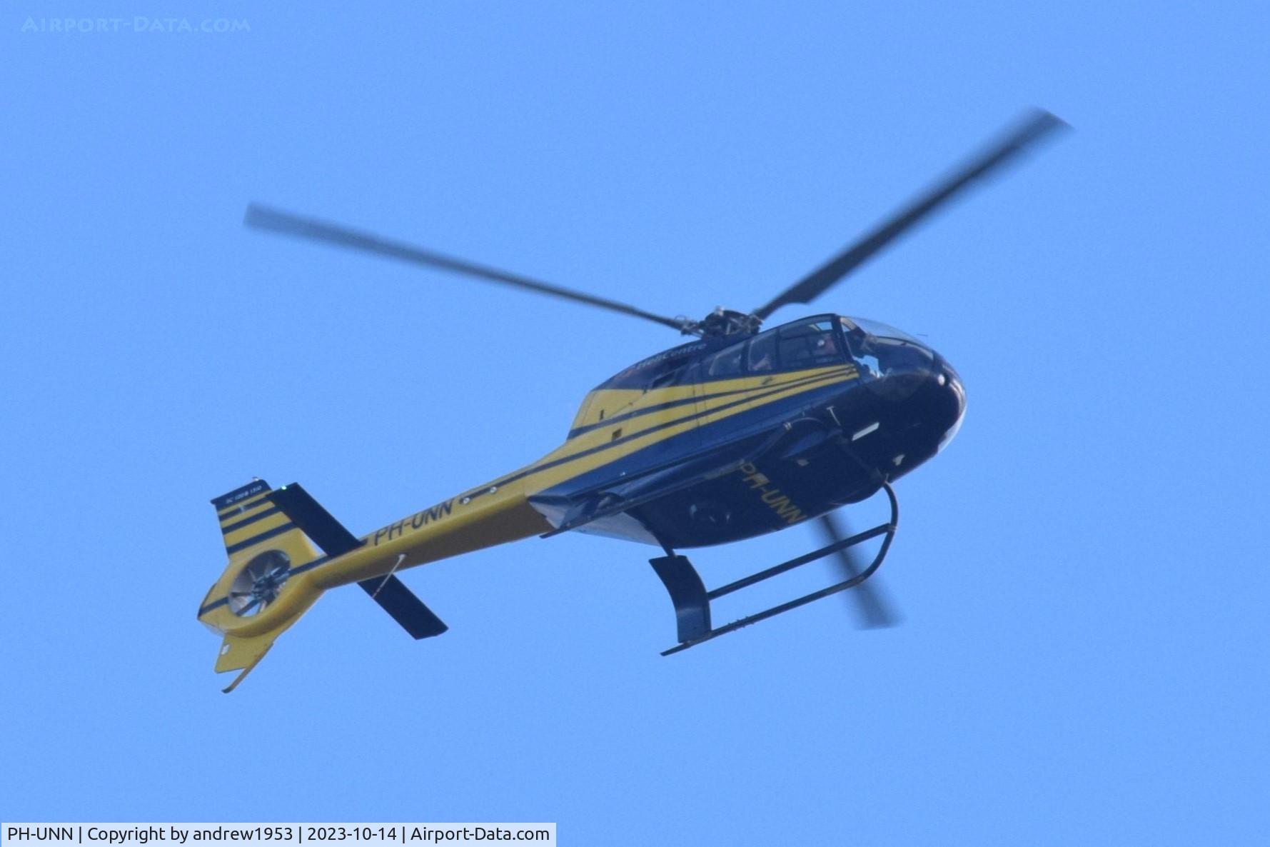 PH-UNN, 2002 Eurocopter EC-120B Colibri C/N 1310, PH-UNN over the Bristol Channel.