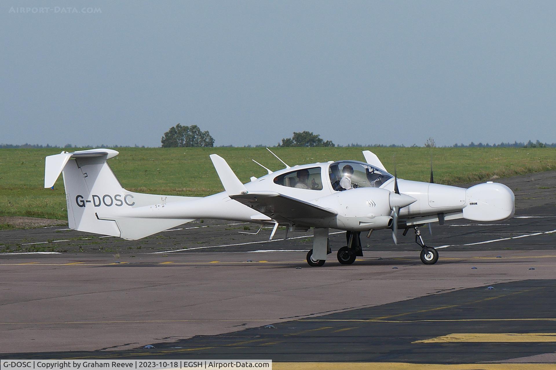 G-DOSC, Diamond DA-42M Twin Star C/N 42M.001, Departing from Norwich. Note the modified nose.