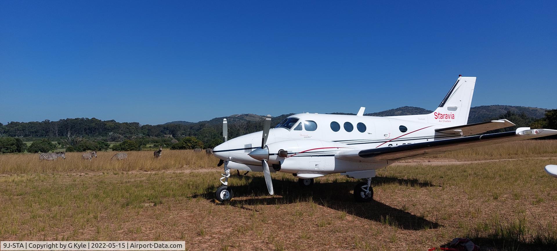 9J-STA, 1974 Beech E90 King Air C/N LW-116, At a bush strip in Zambia