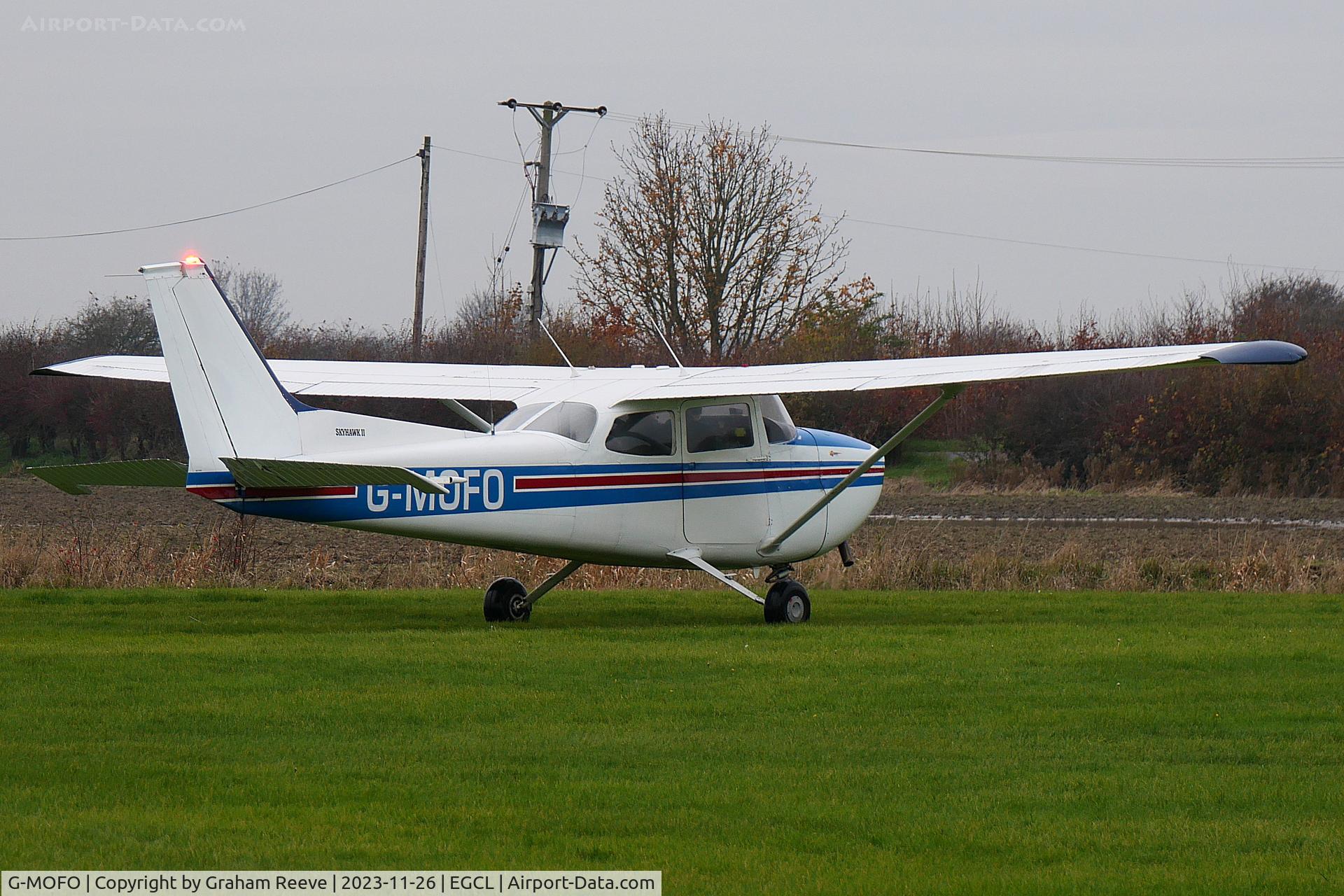 G-MOFO, 1974 Reims Cessna F172M Skyhawk C/N 1192, Departing from Fenland.