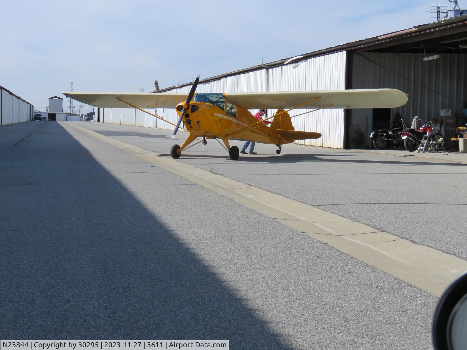 N23844, 1939 Taylorcraft BL-65 (L-2F) C/N 1480, Going back in the hanger