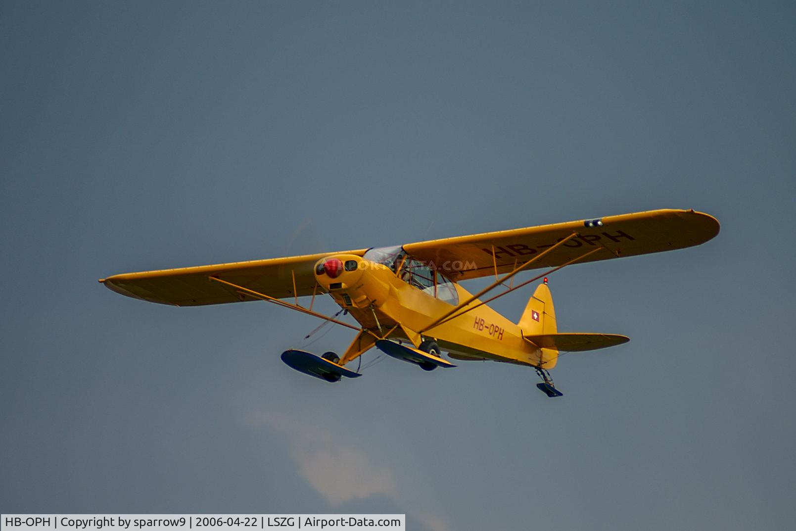 HB-OPH, 1957 Piper PA-18-150 Super Cub C/N 18-5517, Climbing out of Grenchen