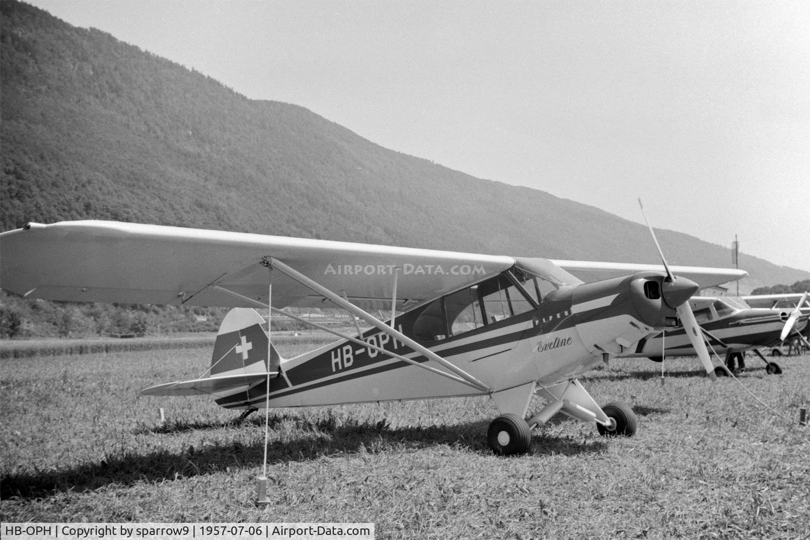 HB-OPH, 1957 Piper PA-18-150 Super Cub C/N 18-5517, A newly registered aircraft shown at Biel-boezingen airfield (closed) during the Rally de la Montre. HB-registered since 1957-04-24. Scanned from a 6x9 b/w negative.