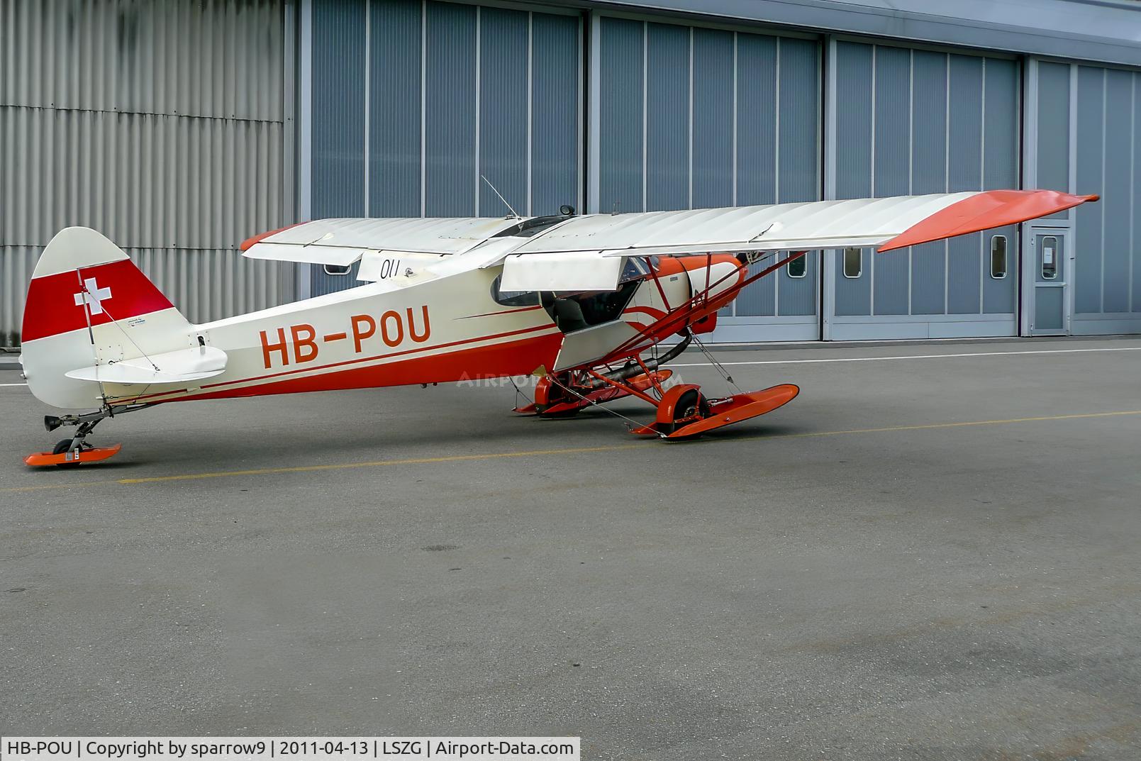 HB-POU, 1957 Piper PA-18-150 Super Cub Super Cub C/N 18-5731, From behind at Grenchen, full flaps.