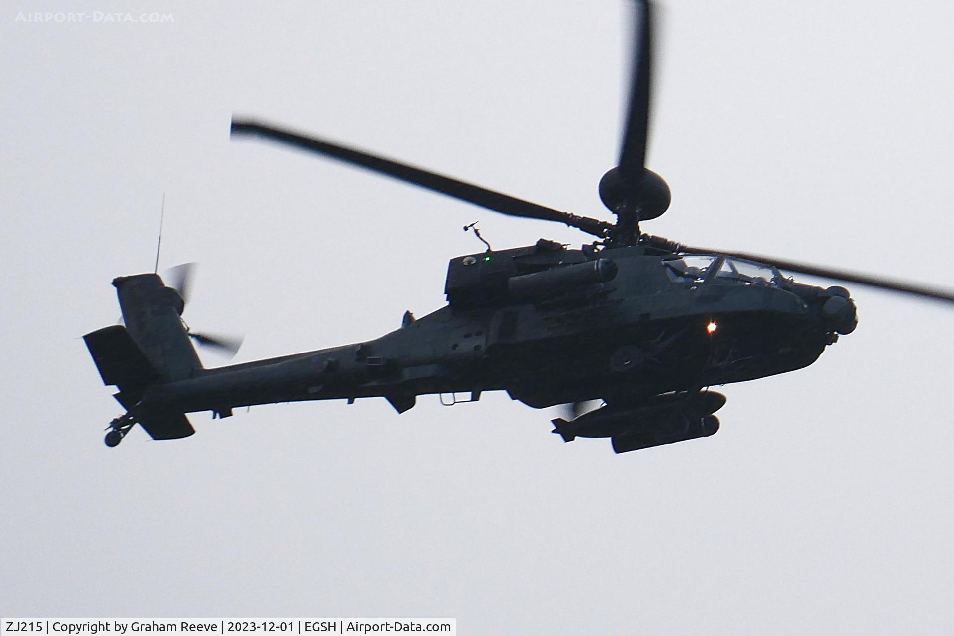 ZJ215, Westland Apache AH.1 C/N WAH.049, Low over Blofield, Norfolk during a snow shower.