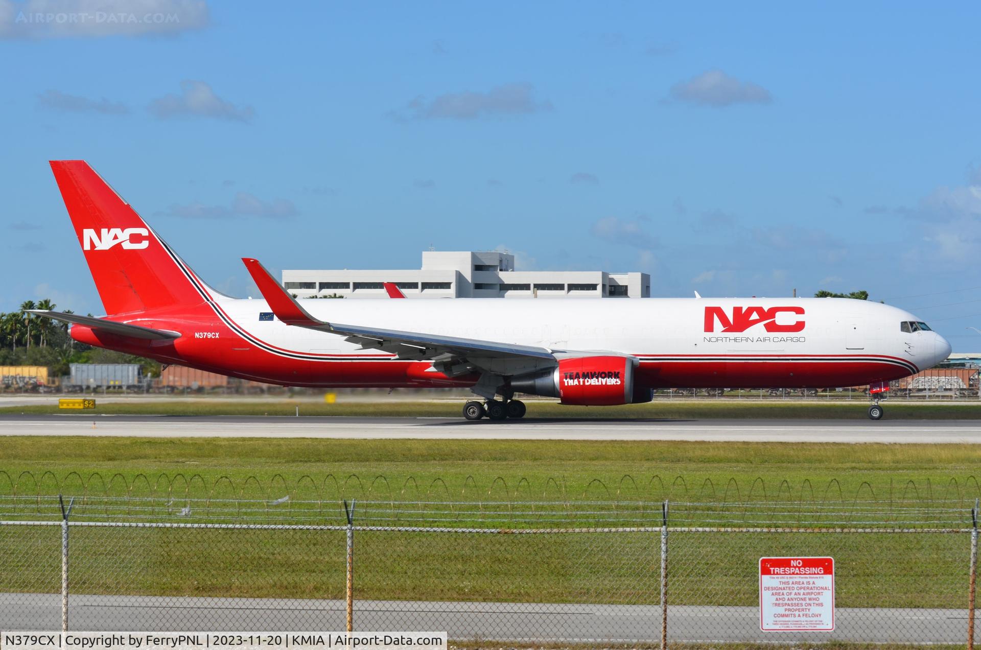 N379CX, 1992 Boeing 767-323 C/N 25199, Nice bright red NAC B763F departing MIA