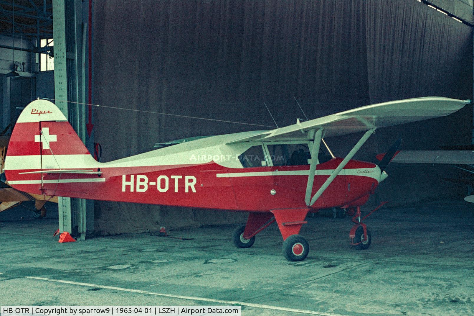 HB-OTR, 1960 Piper PA-22-150 Caribbean C/N 22-7525, In the old hangar at Zurich airport. Scanned from a slide.