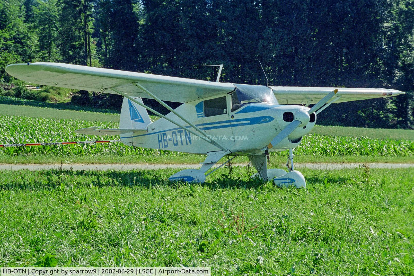 HB-OTN, 1961 Piper PA-22-108 Colt Colt C/N 22-8221, RIO Ecuvillens. Scanned from a slide.