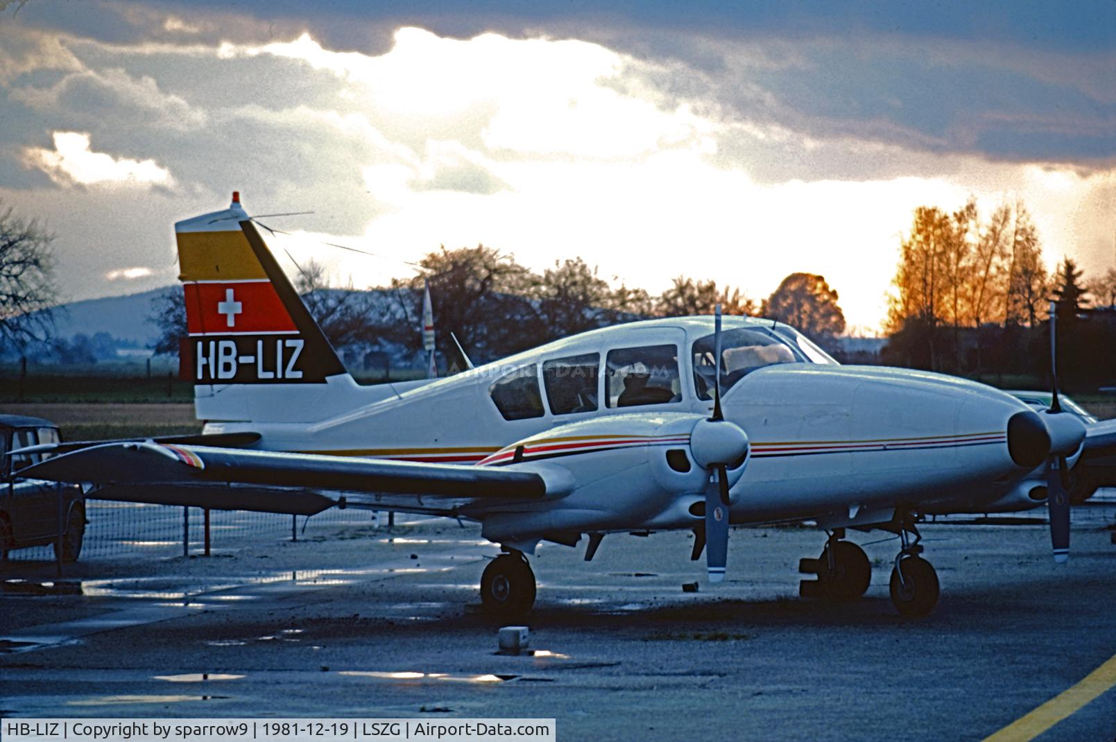 HB-LIZ, 1962 Piper PA-23-250 Aztec C C/N 27-2191, A winter evening at Grenchen. Scanned from a slide.