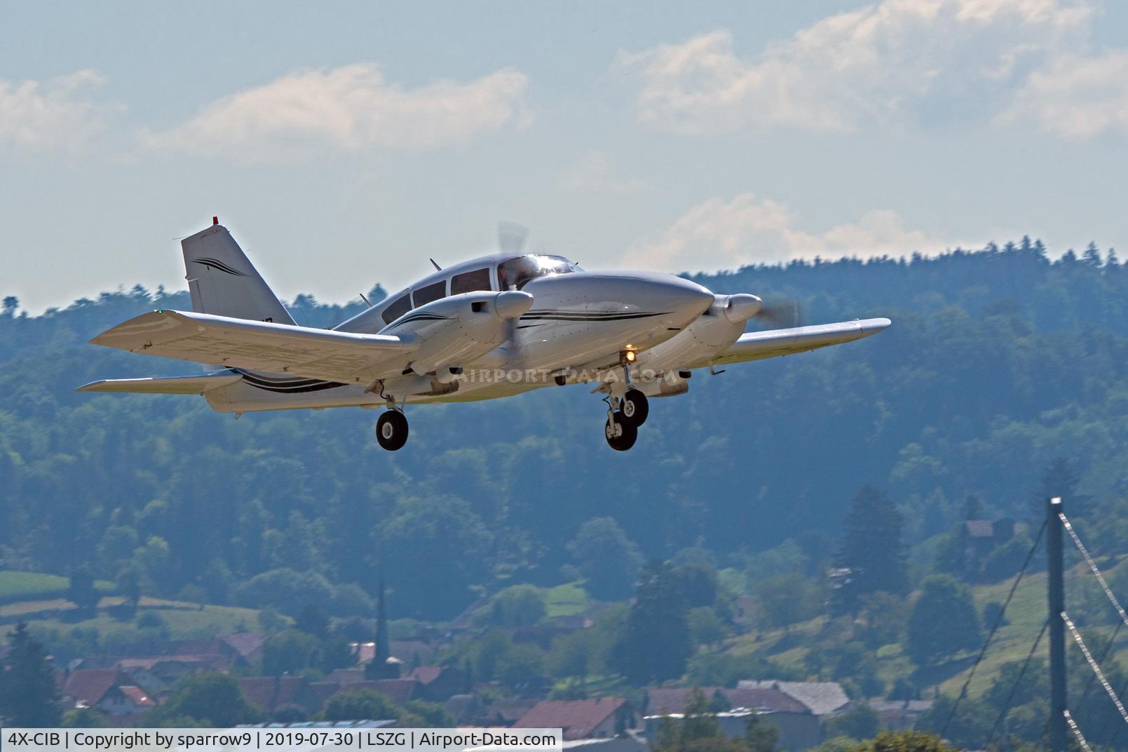 4X-CIB, 1973 Piper PA-23-250 Aztec C/N 27-7305064, Leaving Grenchen.