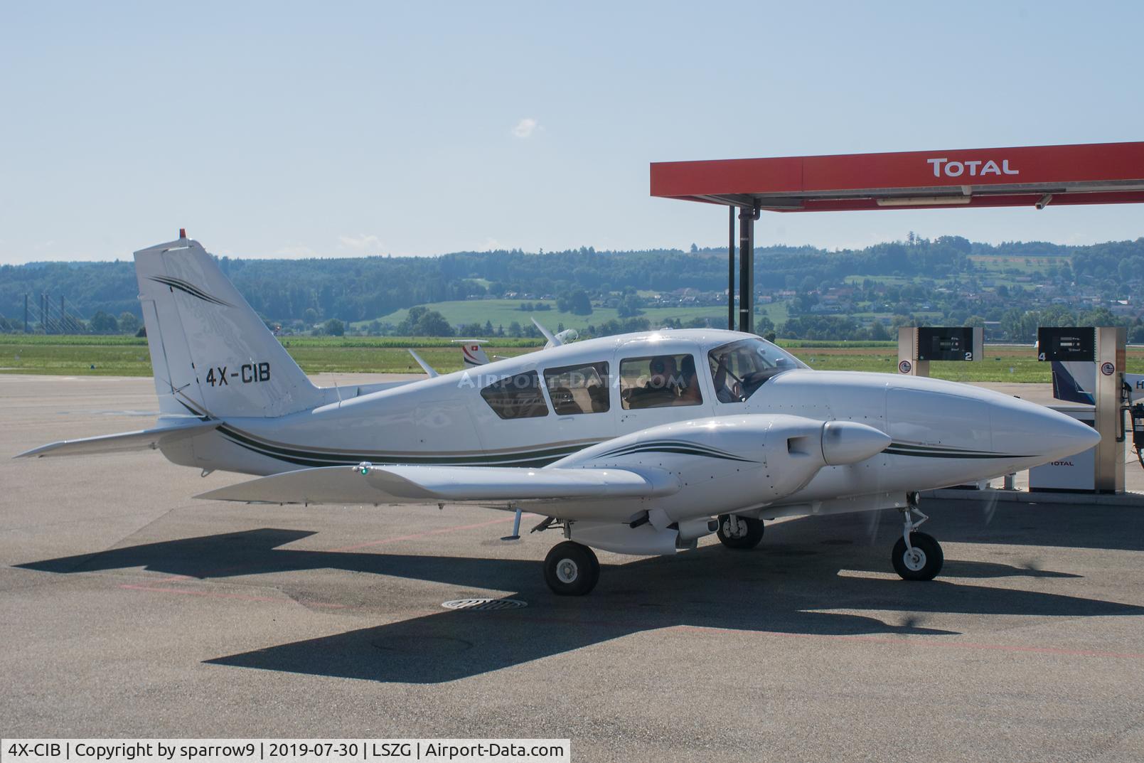 4X-CIB, 1973 Piper PA-23-250 Aztec C/N 27-7305064, Beeing refuelled at Grenchen.