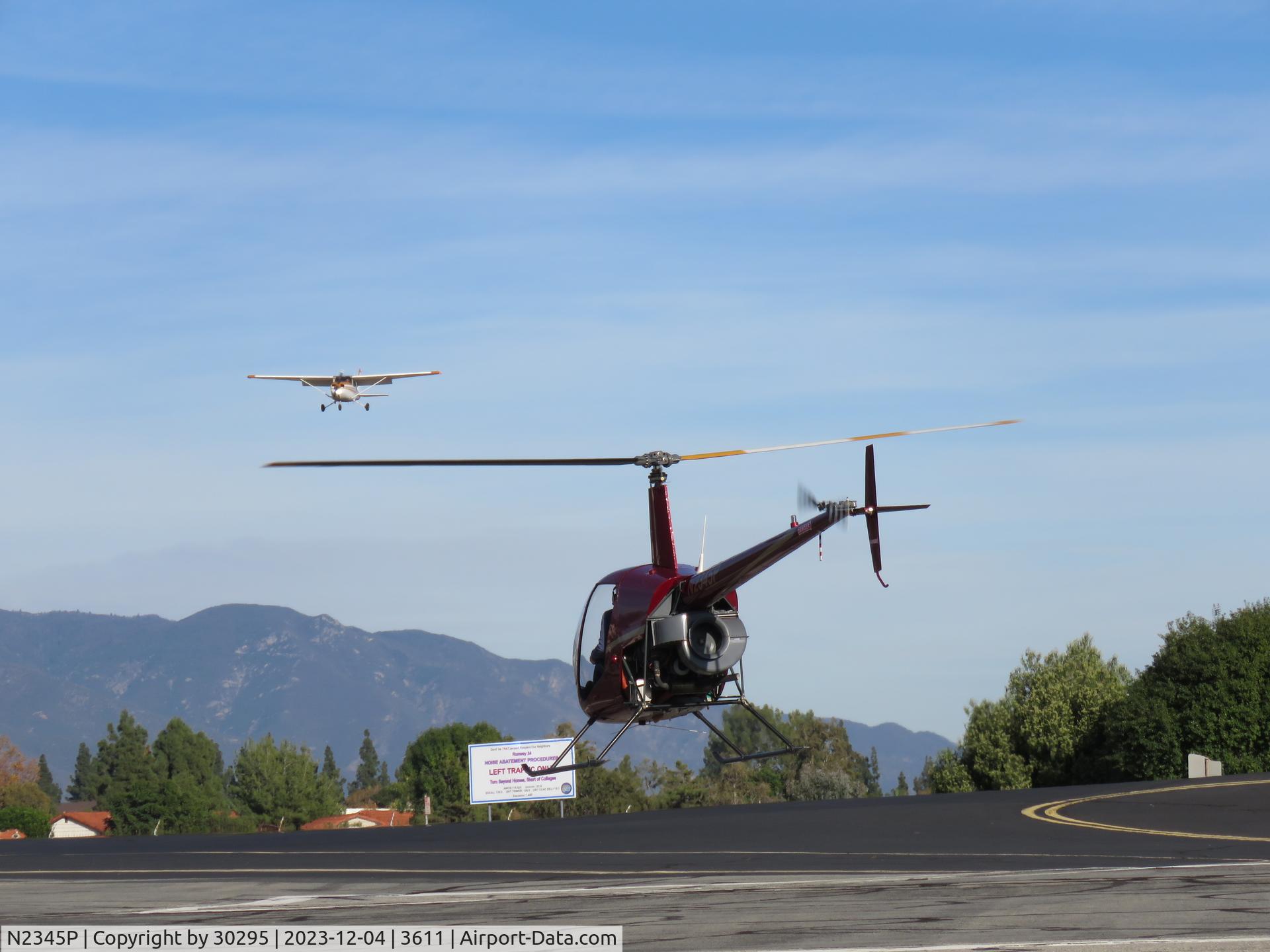 N2345P, 1991 Robinson R22 BETA C/N 1991, Watching and waiting for Cessna to land
