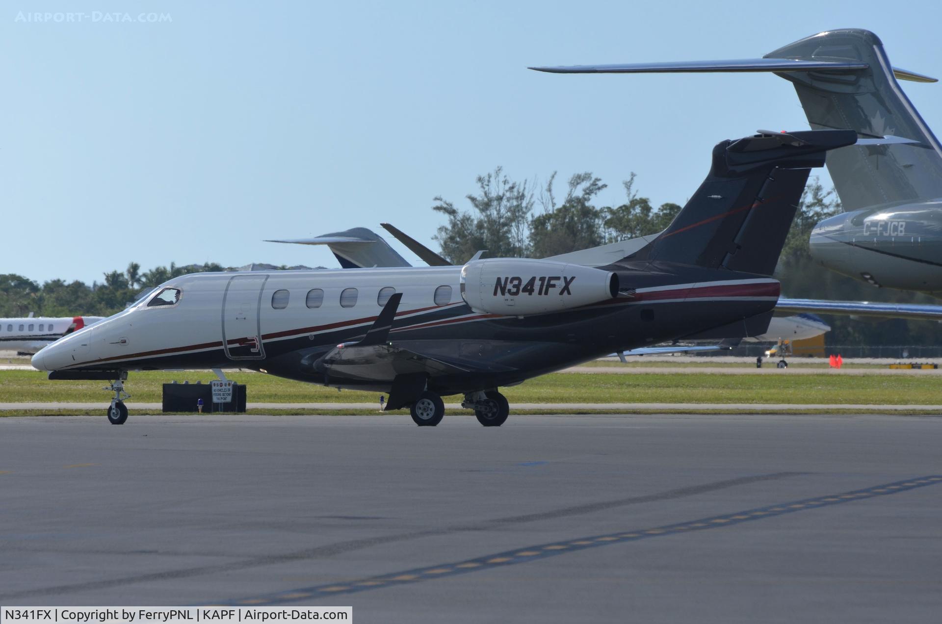 N341FX, 2011 Embraer EMB-505 Phenom 300 C/N 50500047, Flexjet EMB505 taxying passed