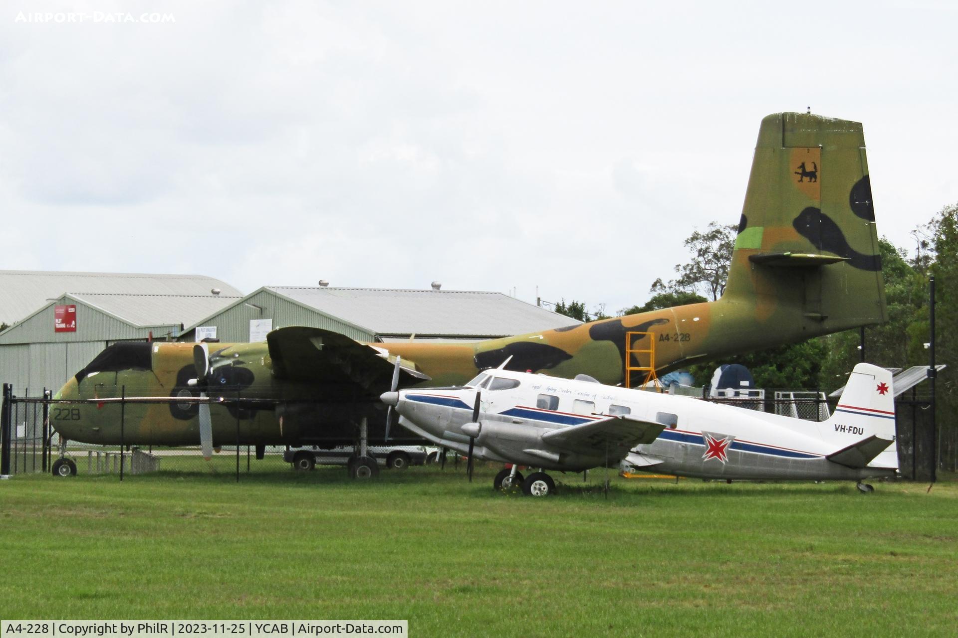 A4-228, De Havilland Canada DHC-4 C/N 228, A4-228 1965 DHC4 Caribou Australian Aviation Heritage Centre foreground VH-FDU 1952 DHA Drover Mk3B Caboolture