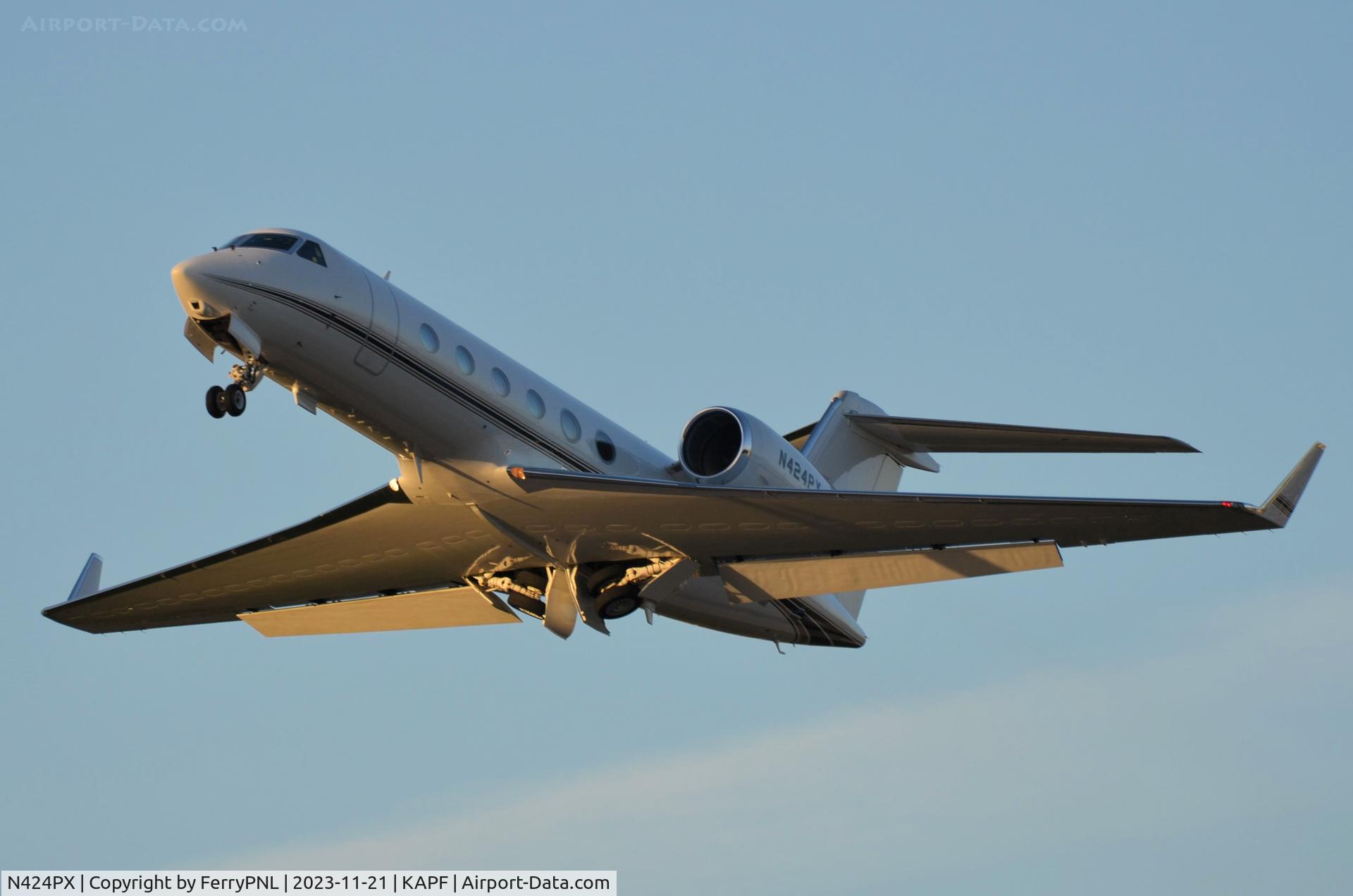 N424PX, 2007 Gulfstream Aerospace GIV-X (G450) C/N 4101, The sun is so low that it lights up the underside of the wings of this departing G4