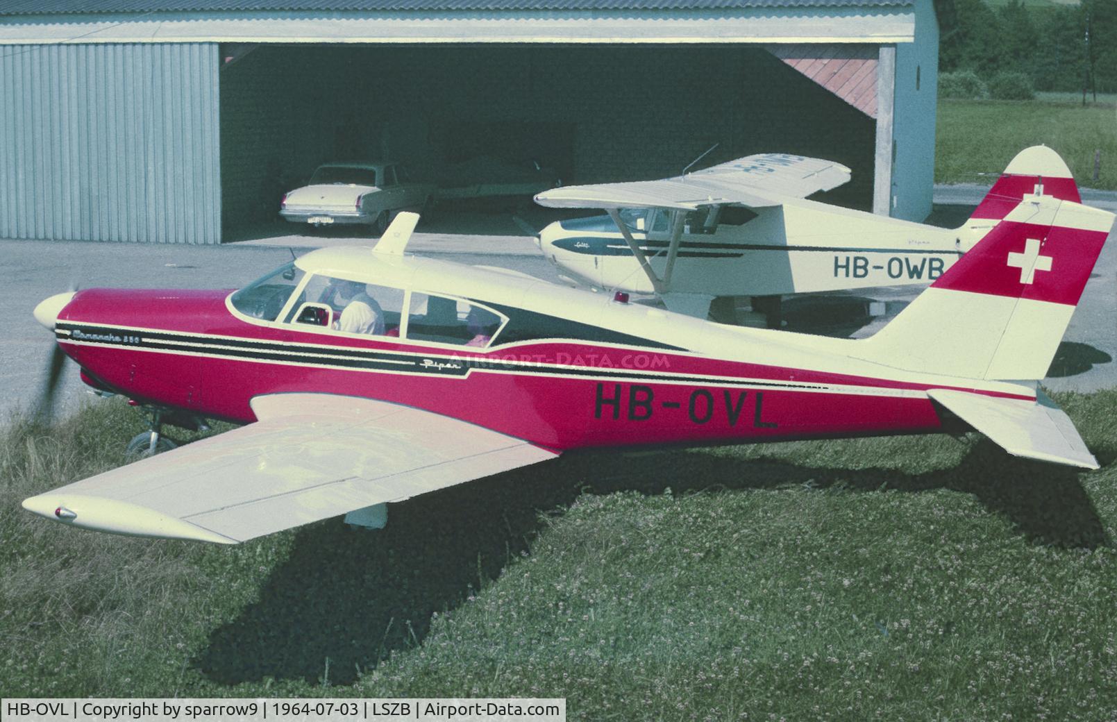 HB-OVL, 1962 Piper PA-24-250 Comanche C/N 24-3347, At the Berne-Belp Piper dealer. Scanned from a slide.