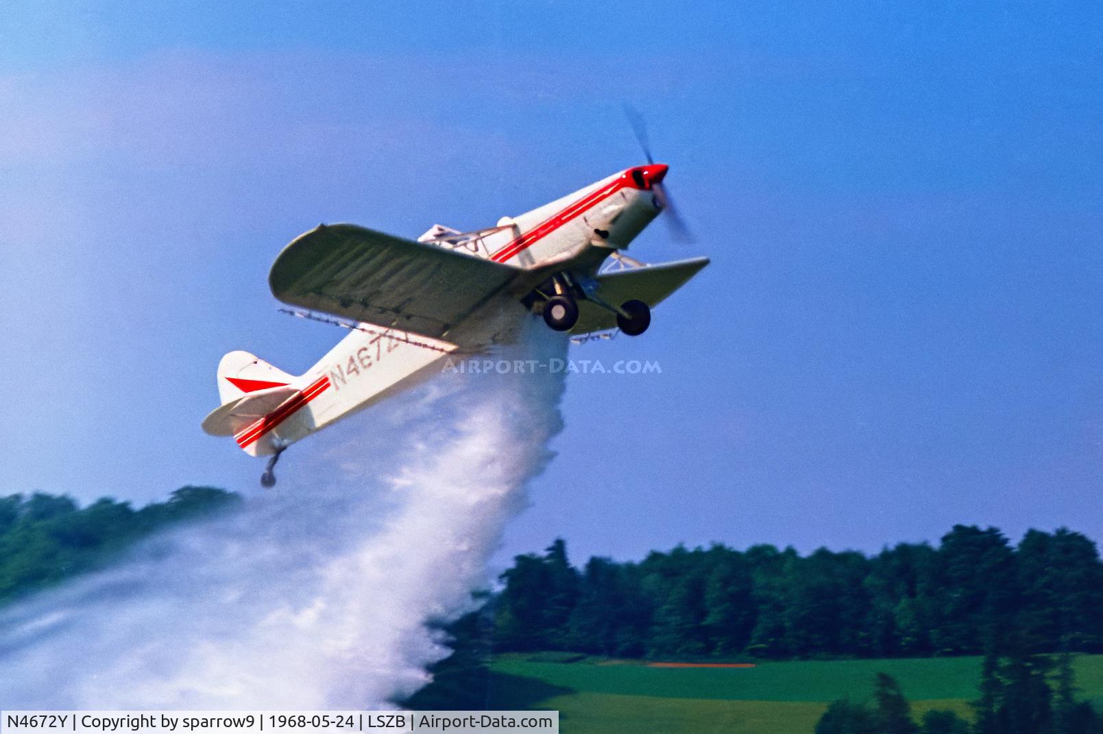 N4672Y, 1967 Piper PA-25-235 Pawnee C/N 25-4377, Spraying demonstration at Berne-Belp. Scanned from a slide.