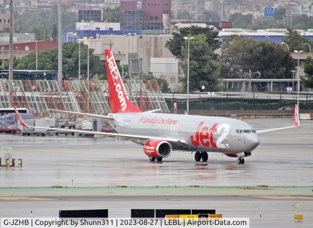 G-JZHB, 2000 Boeing 737-8K5 C/N 28623, Diverted to LEBL during heavy storm this day over Iberic Islands...