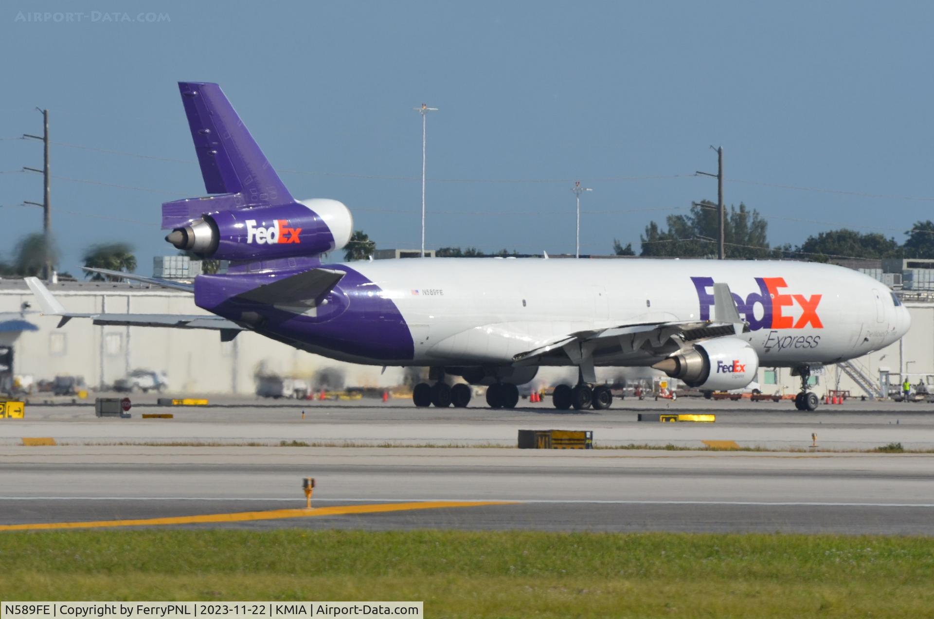 N589FE, 1992 McDonnell Douglas MD-11F C/N 48491, Fedex MD11F departing MIA