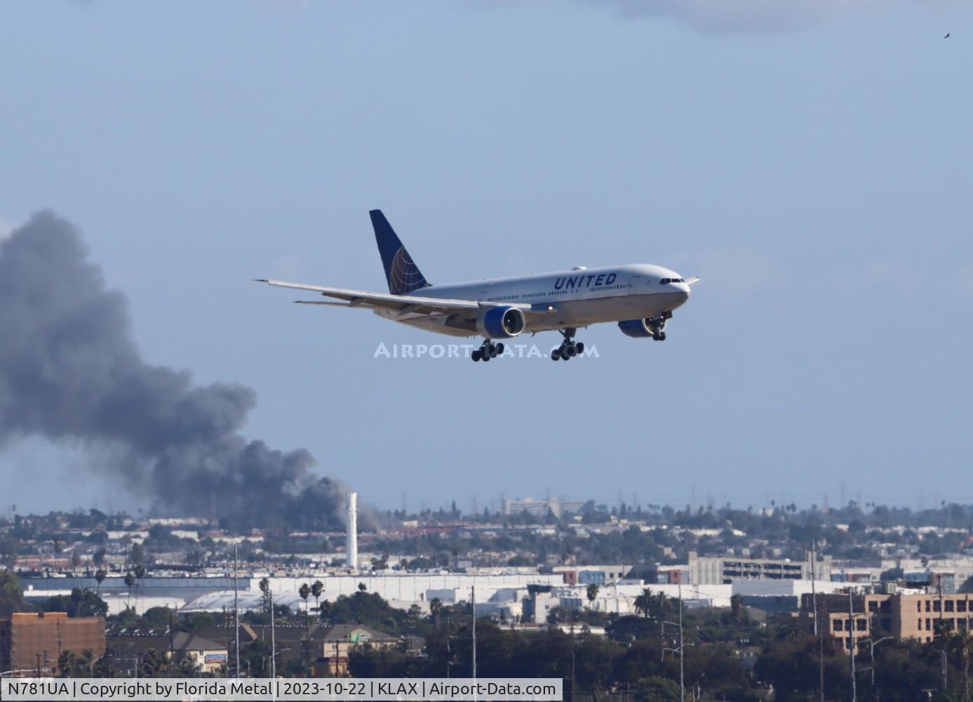 N781UA, 1996 Boeing 777-222 C/N 26945, UAL 772 zx EWR-LAX (warehouse fire a few miles SE)