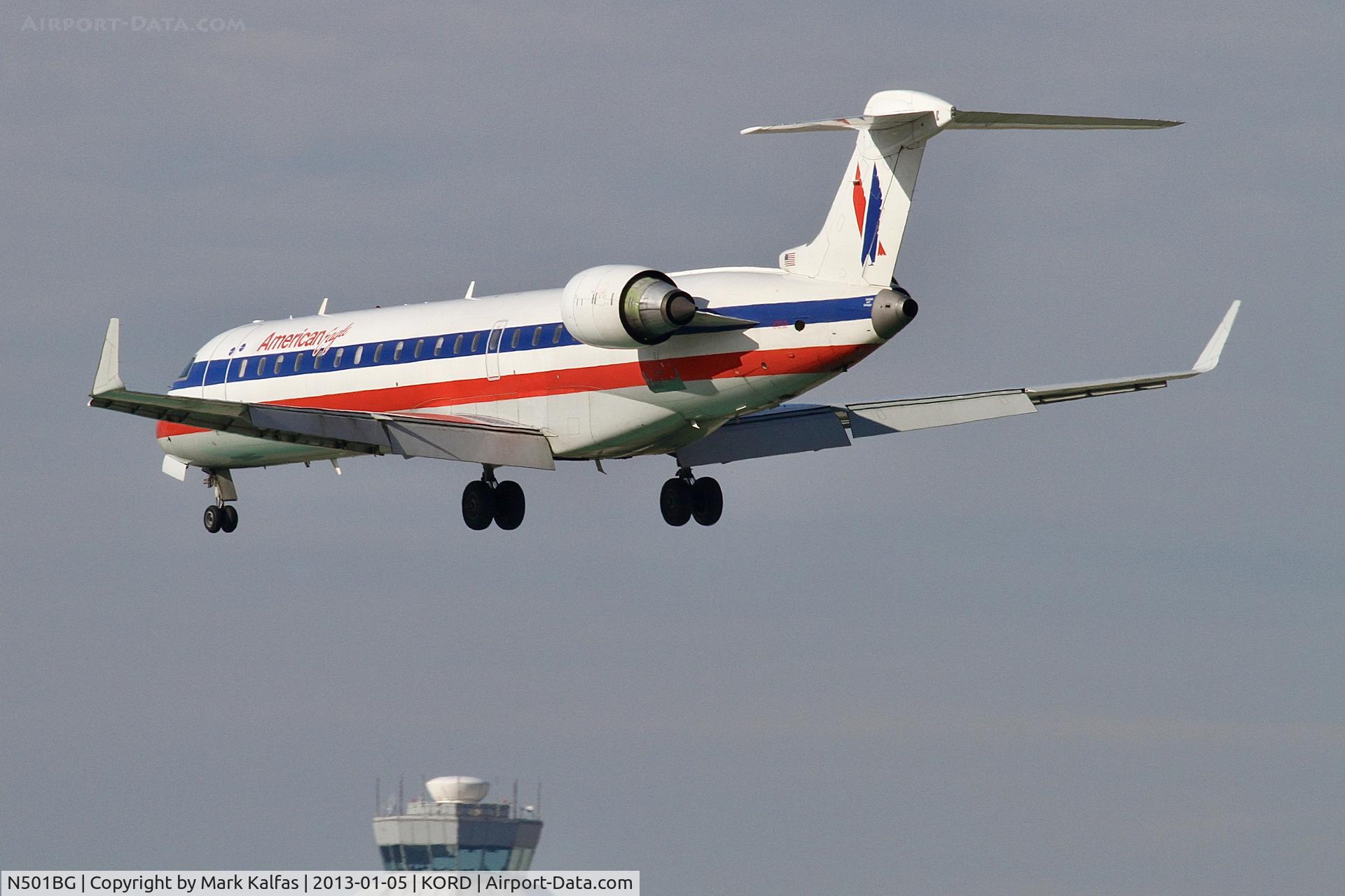 N501BG, 2001 Bombardier CRJ-701ER (CL-600-2C10) Regional Jet C/N 10017, American Eagle CRJ7 Bombardier CL-600-2C10, N501BG, on approach KORD