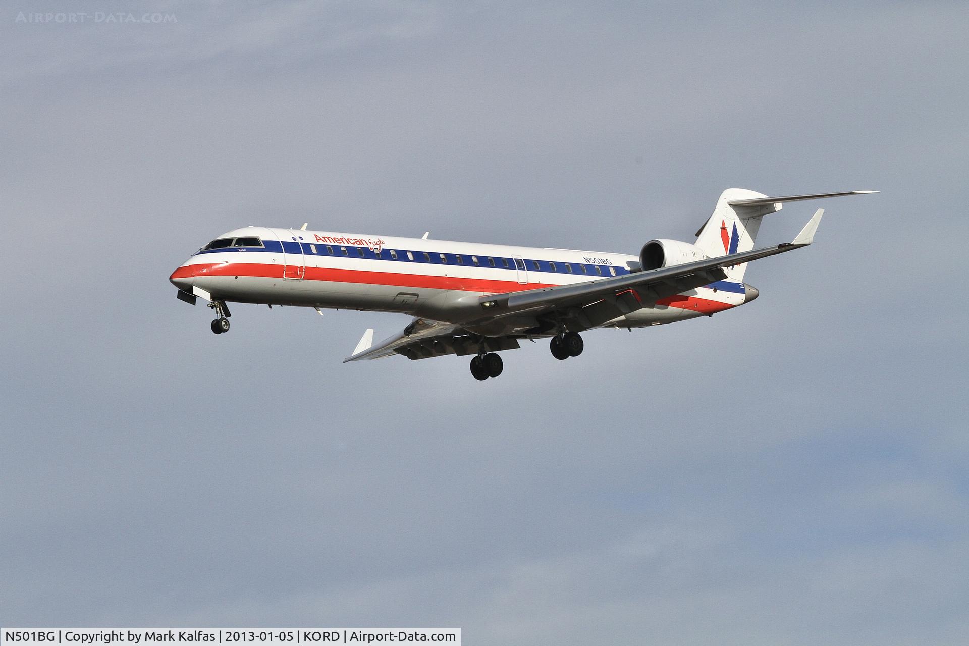 N501BG, 2001 Bombardier CRJ-701ER (CL-600-2C10) Regional Jet C/N 10017, American Eagle CRJ7 Bombardier CL-600-2C10, N501BG, on approach KORD