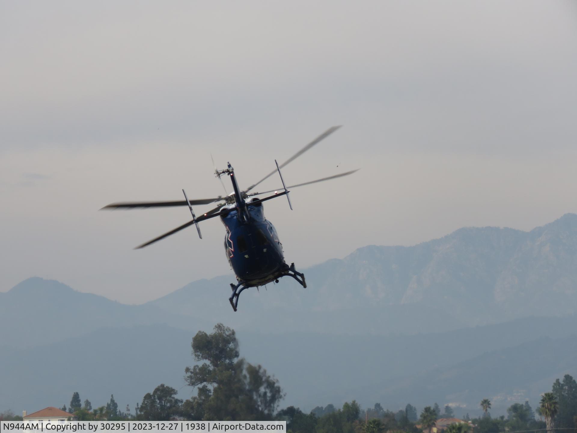 N944AM, 2004 Eurocopter-Kawasaki EC-145 (BK-117C-2) C/N 9044, Turning westbound on