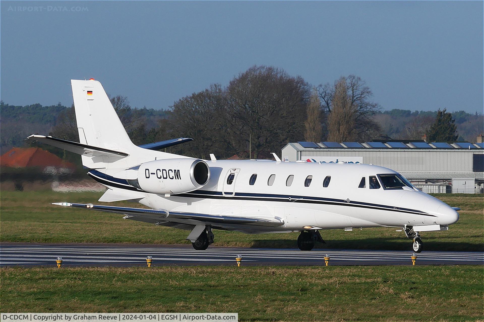 D-CDCM, 2012 Cessna 560 Citation XLS+ C/N 560-6109, Departing from Norwich.