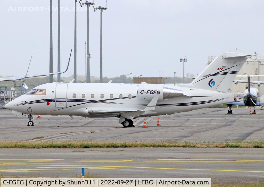 C-FGFG, 1998 Bombardier Challenger 604 (CL-600-2B16) C/N 5383, PArked at the General Aviation area...