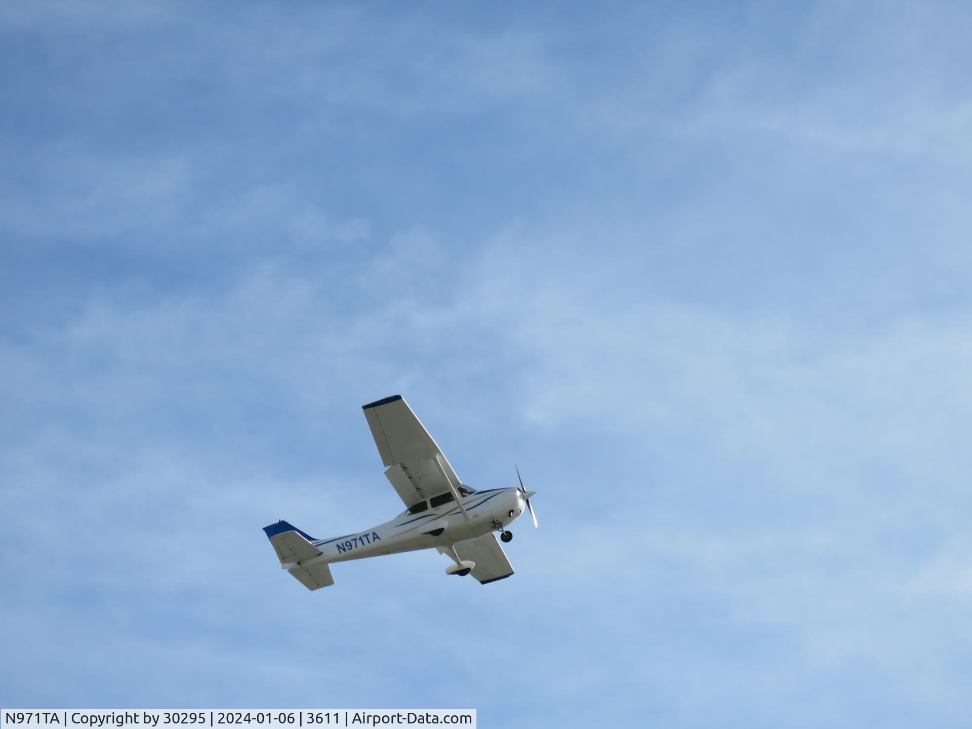 N971TA, 2002 Cessna 172S C/N 172S9170, Flying past